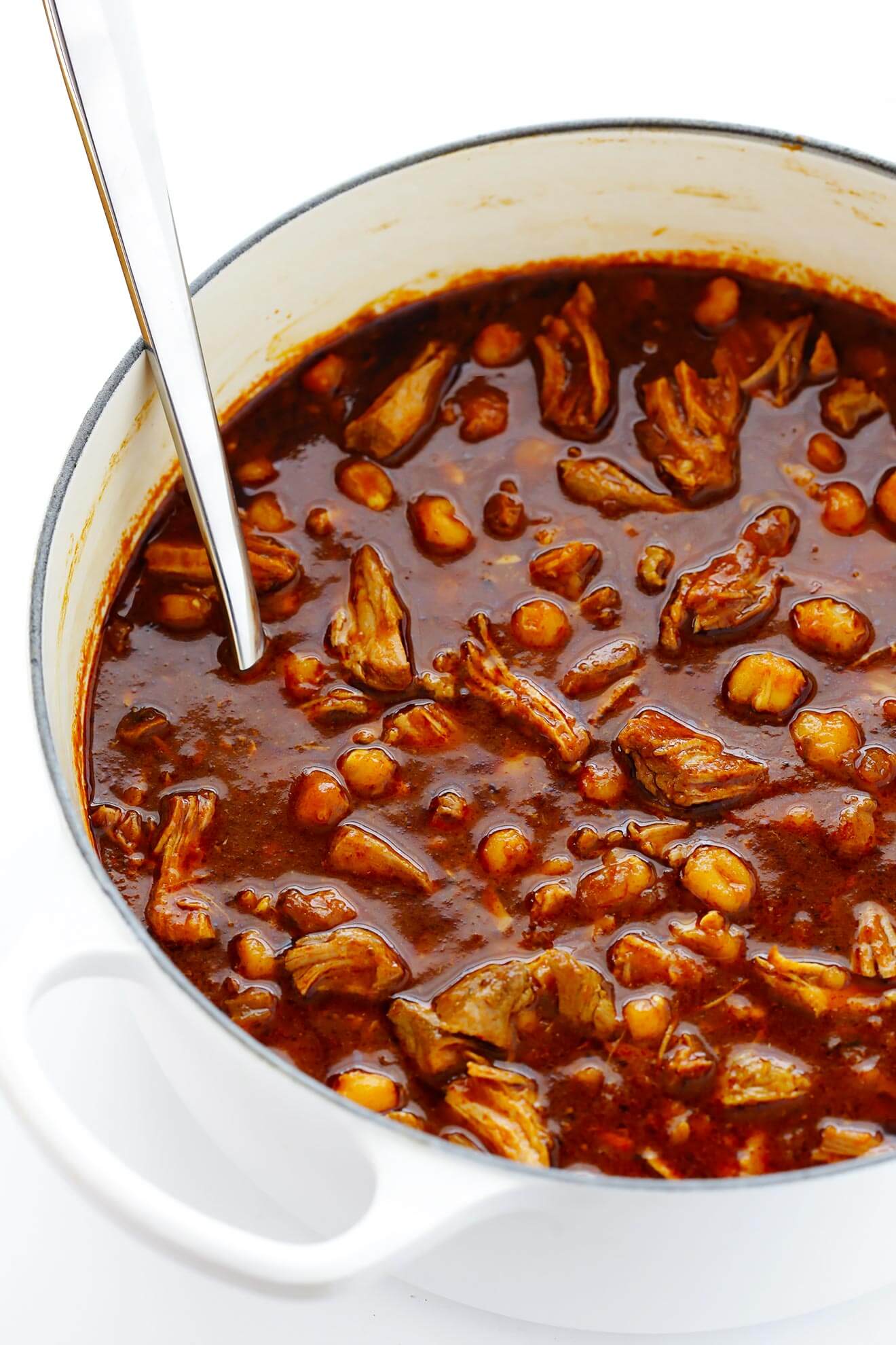 Traditional Mexican Posole Rojo is slow-simmered with tender pork and chiles, and it's amazingly delicious! | gimmesomeoven.com (Gluten-Free)