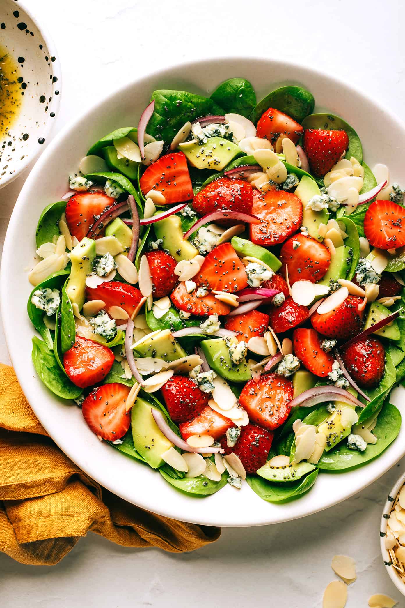 Strawberry Avocado Spinach Salad with Poppyseed Dressing in Bowl