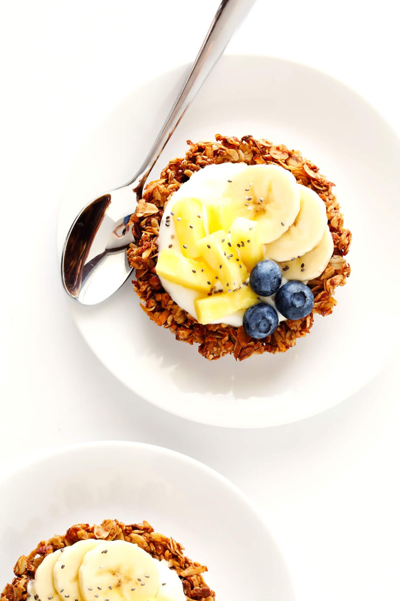 These Mini Granola Tart Cups are a cute and delicious way to serve your granola! Fill them with yogurt and fruit for breakfast, no-bake fillings for dessert, or whatever sounds good. | gimmesomeoven.com (Gluten-Free / Vegetarian)