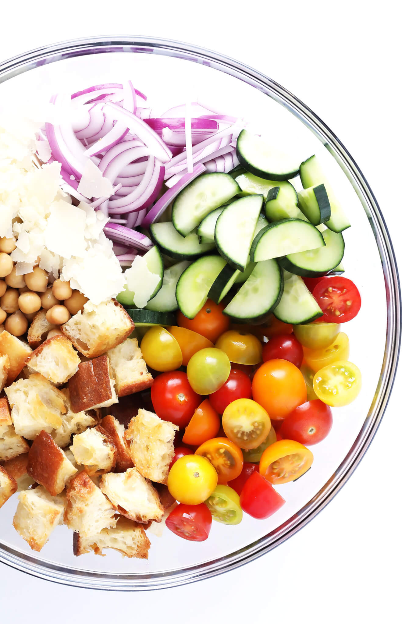 LOVE this easy panzanella recipe! It's full of cherry tomatoes, veggies, toasted buttery bread, chickpeas, basil, and tossed in a delicious Italian vinaigrette. Perfect for summertime! | gimmesomeoven.com (Vegetarian)