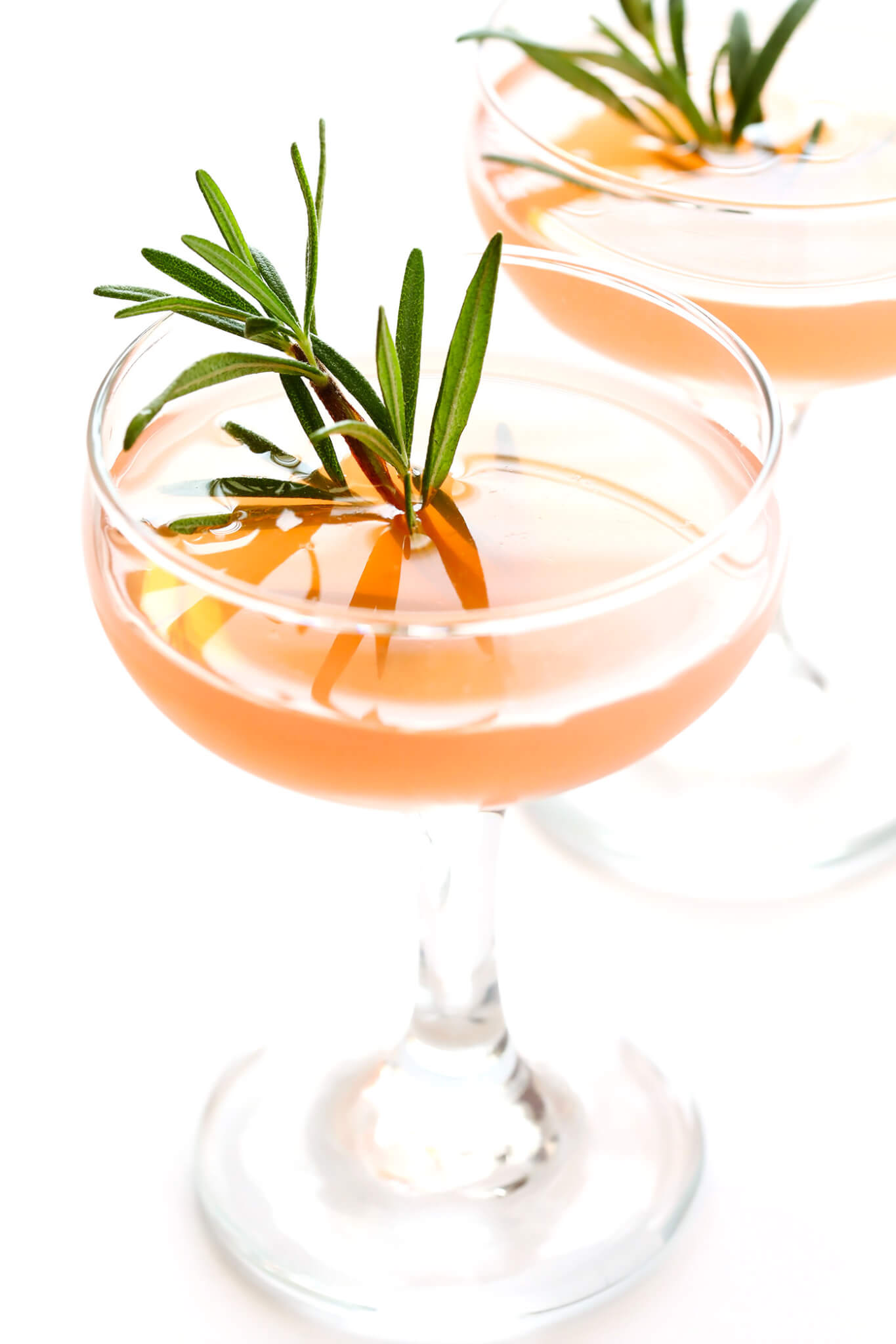 These refreshing 30-second cocktails are quick and easy to make, they're made with gin (or vodka), St. Germain (elderflower liqueur) and grapefruit juice, and garnished with a sprig of fresh rosemary.  They are classically known as the "Frenchie" or "Frenchy" cocktail -- so delicious!