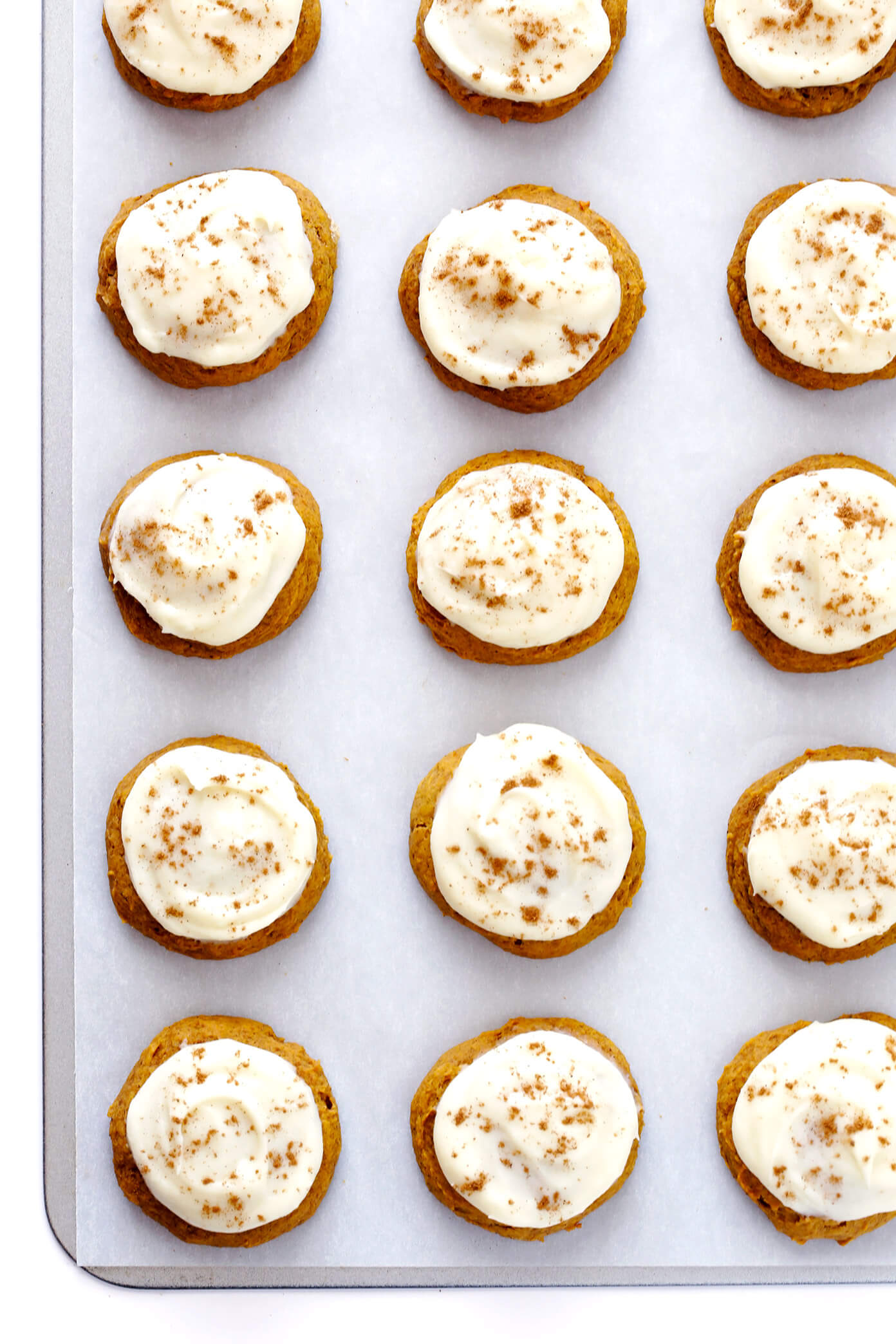 My favorite pumpkin cookie recipe! These soft and delicious pumpkin cookies are iced with a heavenly cream cheese frosting, and are the perfect treat for fall dessert baking. So delicious! | gimmesomeoven.com