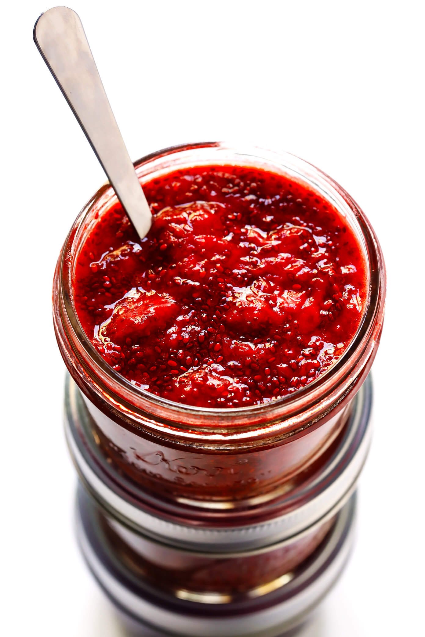 This 10-Minute Chia Seed Jam recipe is super easy to make, it's made with just 1 tablespoon of honey (instead of tons of added sugars!), it's perfect for breakfasts (toast, parfaits, etc.), sandwiches, cookies, and more, and it's SO delicious! Feel free to make it with your favorite juicy fruit (such as strawberry, blackberry, raspberry, peach, etc.). | Gimme Some Oven #chiajam #cleaneating #chiaseed #healthybreakfast