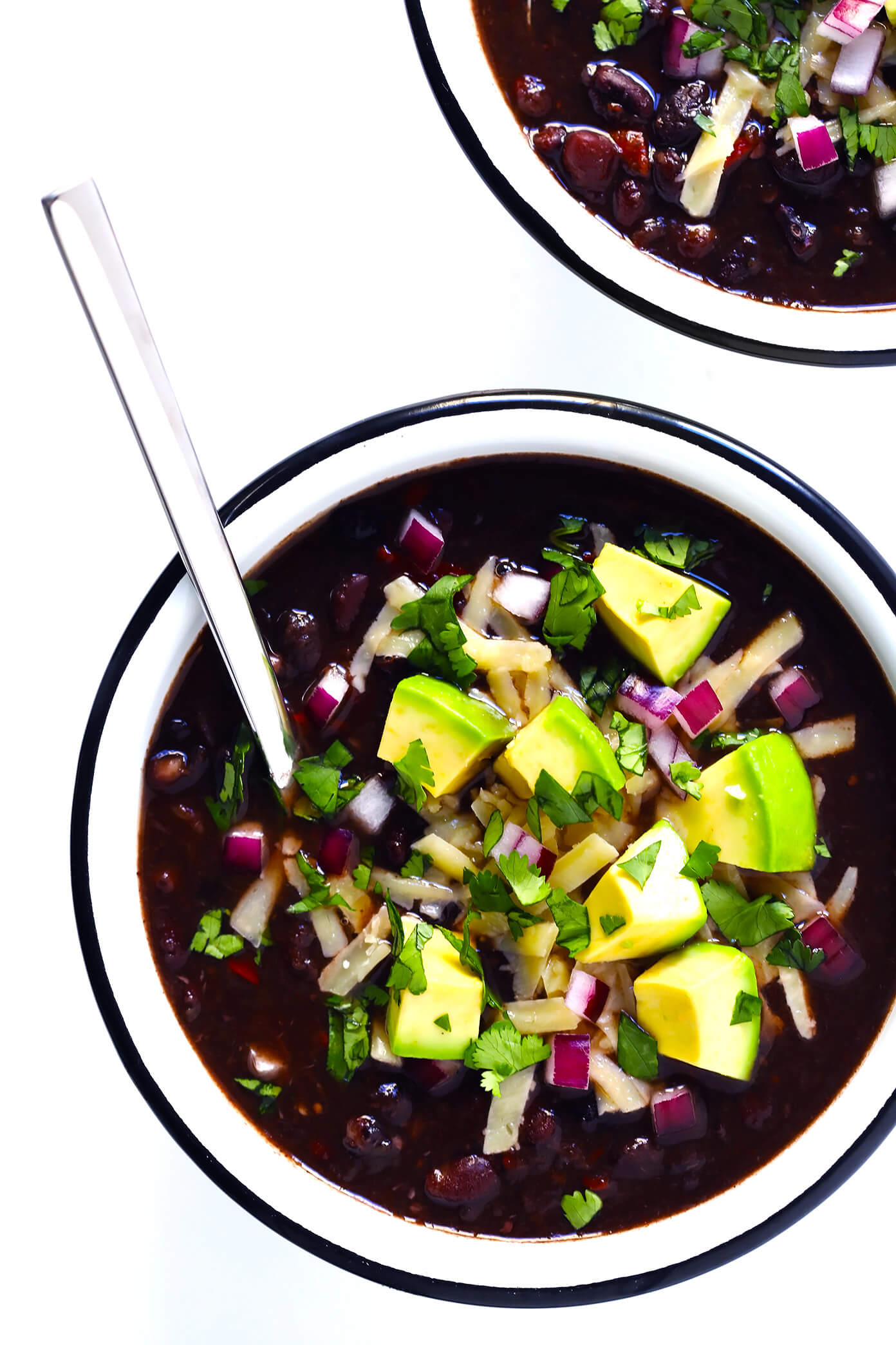 The BEST Black Bean Chili recipe! It's easy to make in the Instant Pot or Crock-Pot or stovetop, it's naturally gluten-free, vegan and vegetarian, and it's full of the most delicious zesty Mexican flavors. | Gimme Some Oven #blackbeanchili #mealprep #vegetarianchili #veganchili #instantpotchili