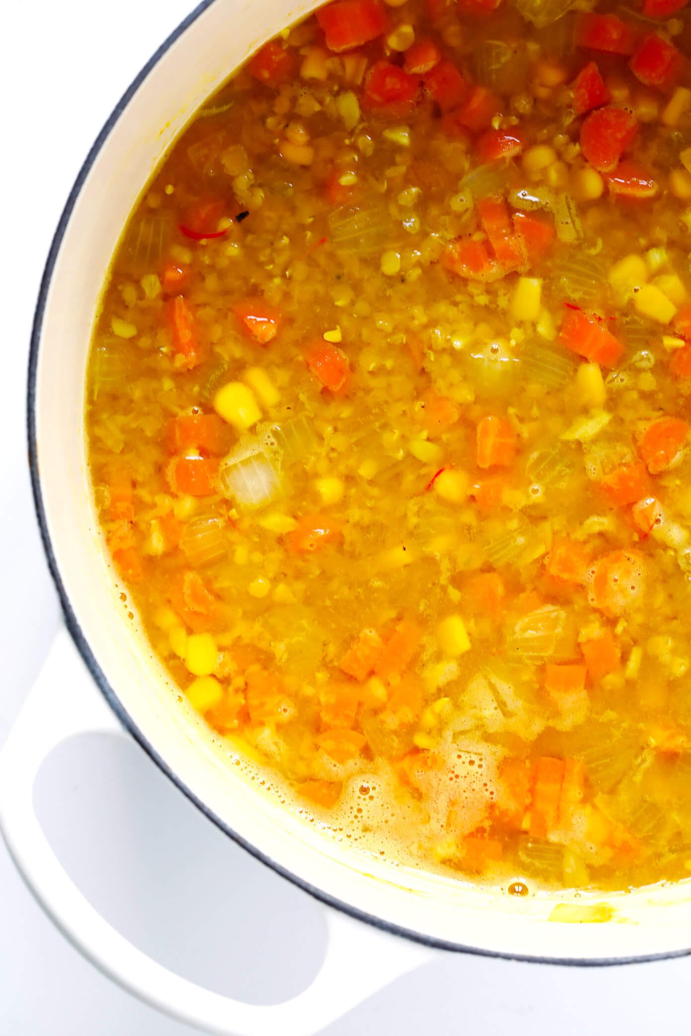 This is the BEST lentil soup recipe!! It's full of amazing lemony flavor, it's naturally healthy and vegan and gluten-free, it's quick and easy to make, and SO delicious. Instant Pot and Slow Cooker instructions included too! | Gimme Some Oven #lentilsoup #instantpot #cleaneating #redlentilsoup #glutenfree #vegan