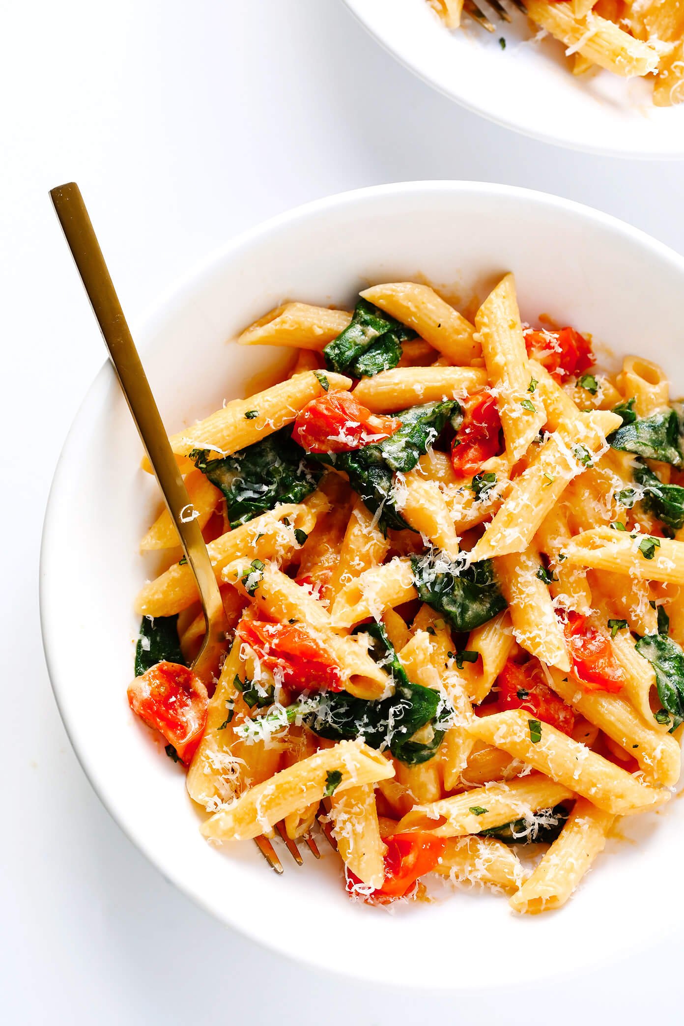 Creamy Rosé Wine Pasta with Roasted Tomatoes and Spinach in bowl