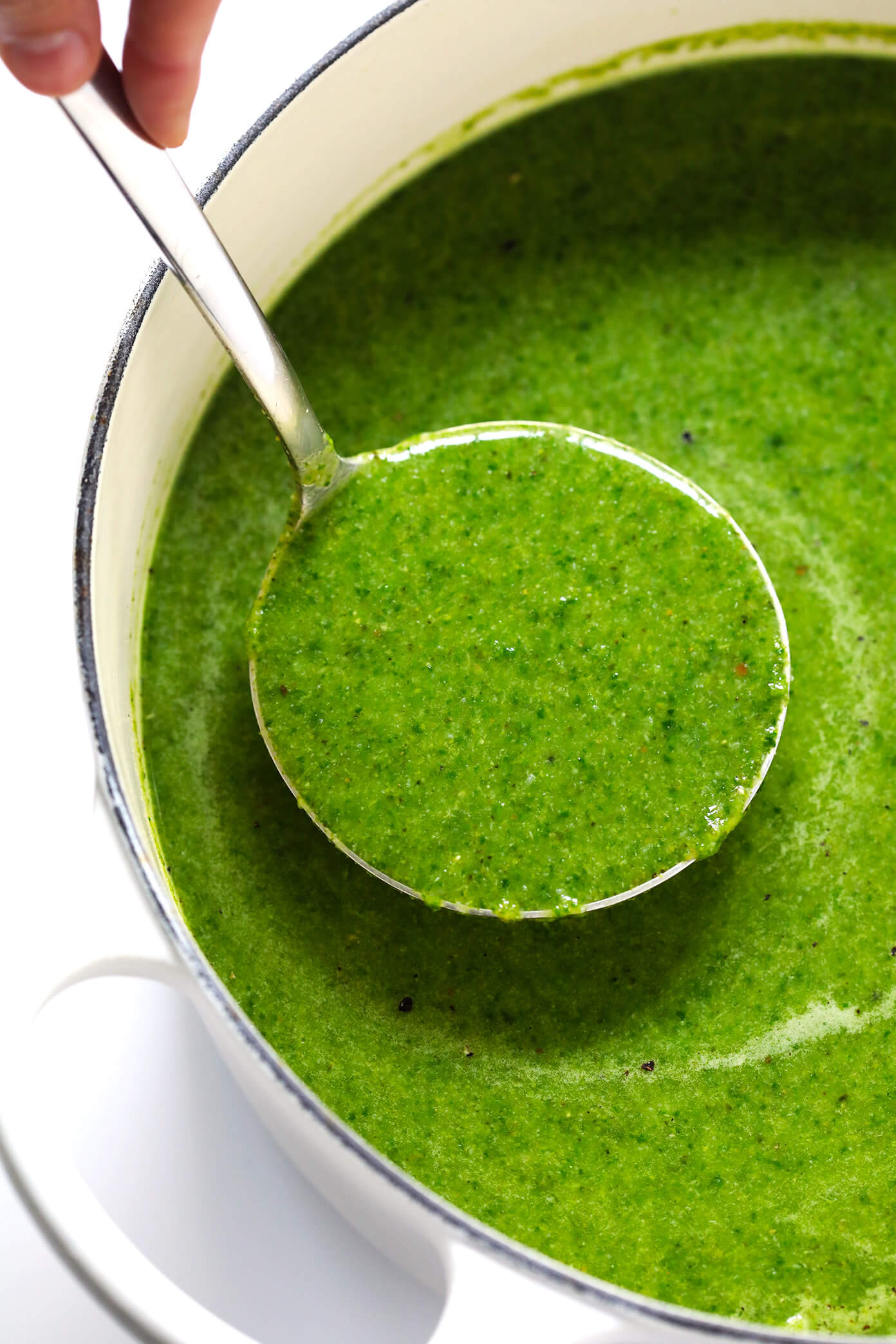 This Green Goddess Soup recipe is overflowing with feel-good veggies and greens (especially broccoli, cauliflower and spinach), it's quick and easy to make, and it tastes and feels great. Bonus? It's also naturally gluten-free and vegan. | Gimme Some Oven #greengoddess #healthyrecipes #souprecipe #broccolisoup #vegetarian Green Goddess Soup in Pot