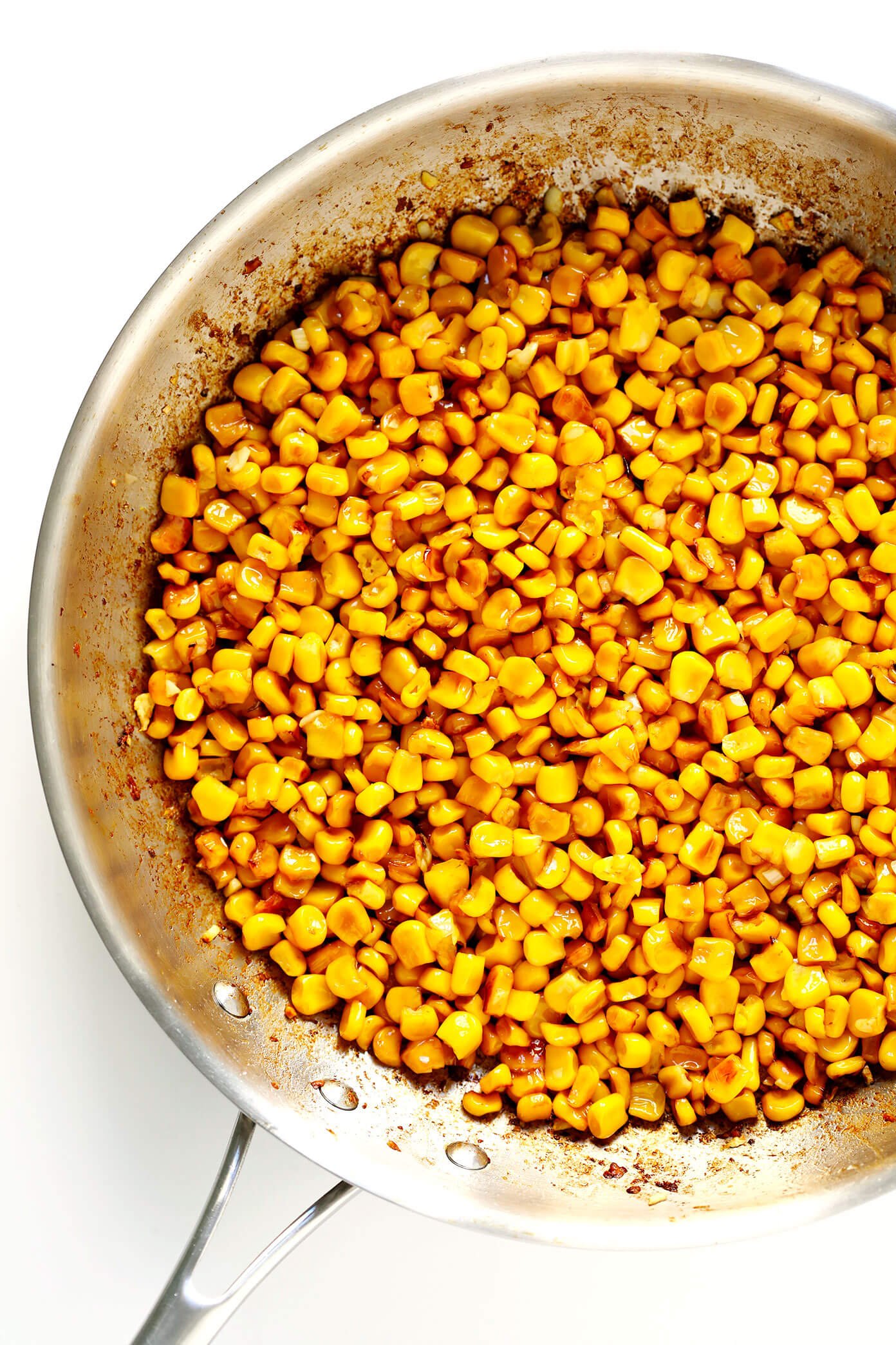 LOVE this Elote Dip recipe! It's quick and easy to make in about 15 minutes, naturally gluten-free, and full of all of those classic Mexican street corn ingredients we all love! And it can double as a salsa or topping for your tacos. | Gimme Some Oven #elote #mexican #corn #dip #salsa #appetizer Pan-Roasted Corn for Elote Dip