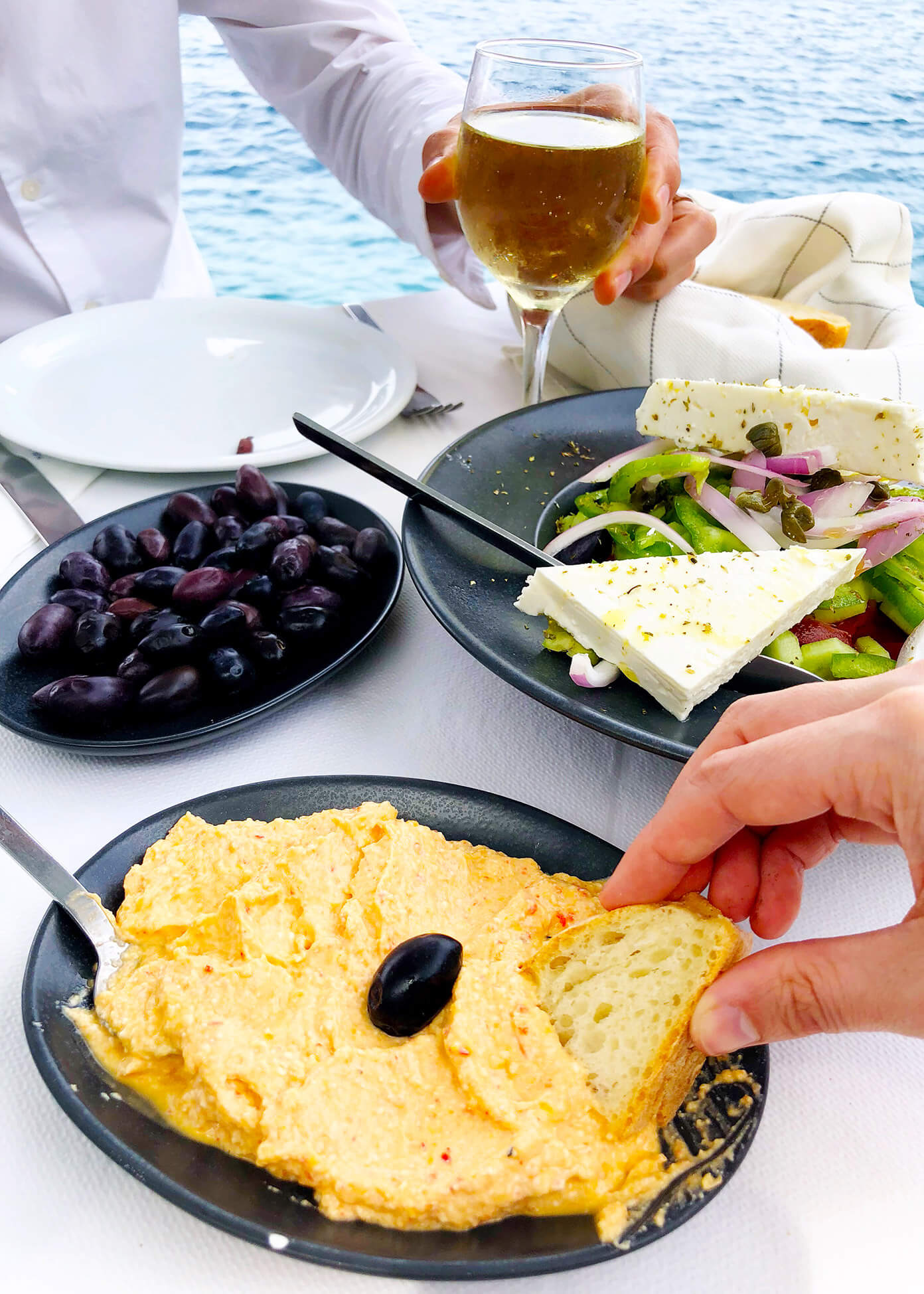 Spicy Cheese Dip, Olives and Greek Salad for Lunch at Sunset Taverna in Santorini, Greece