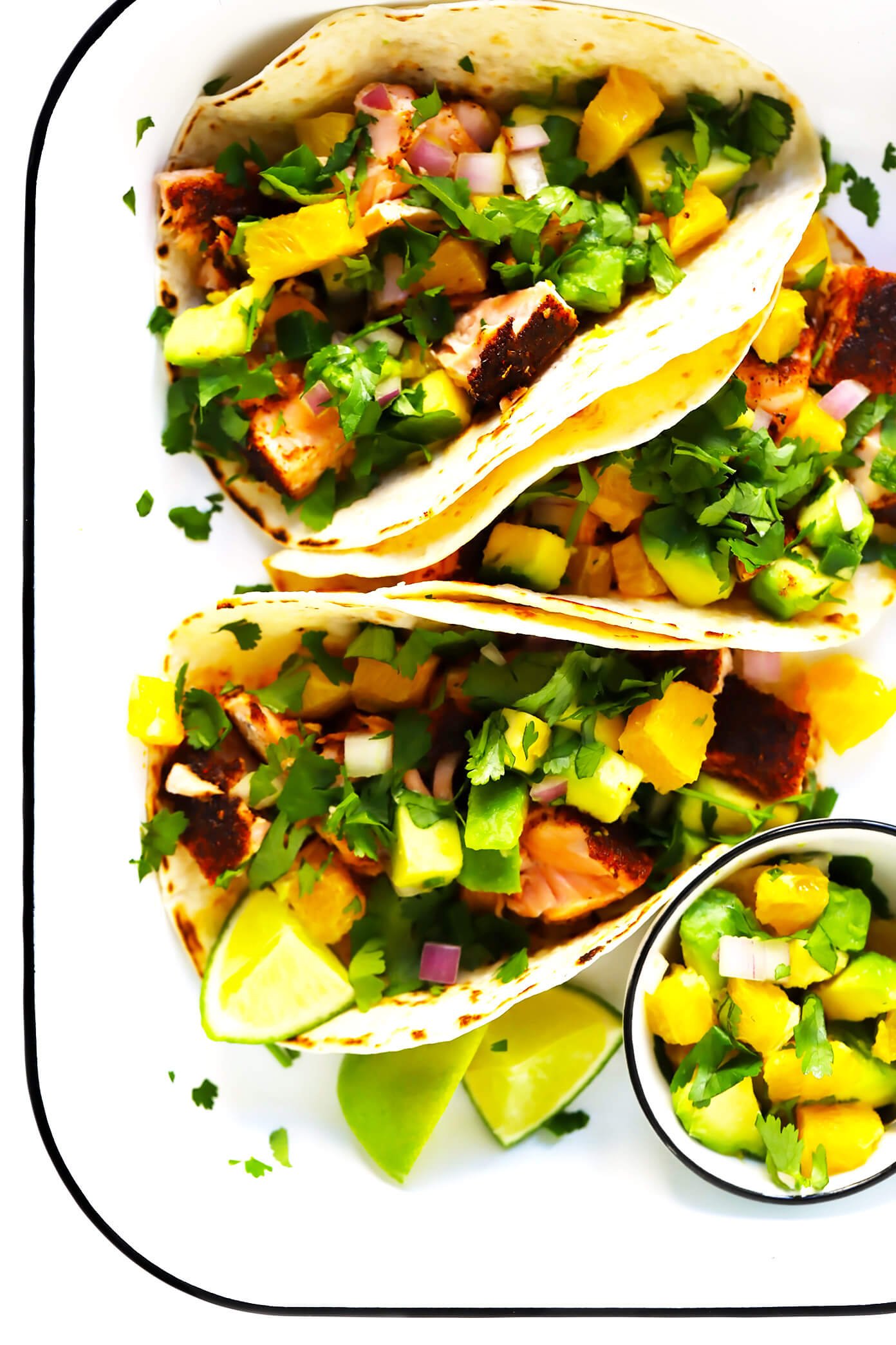 salmon tacos with citrus salsa on top