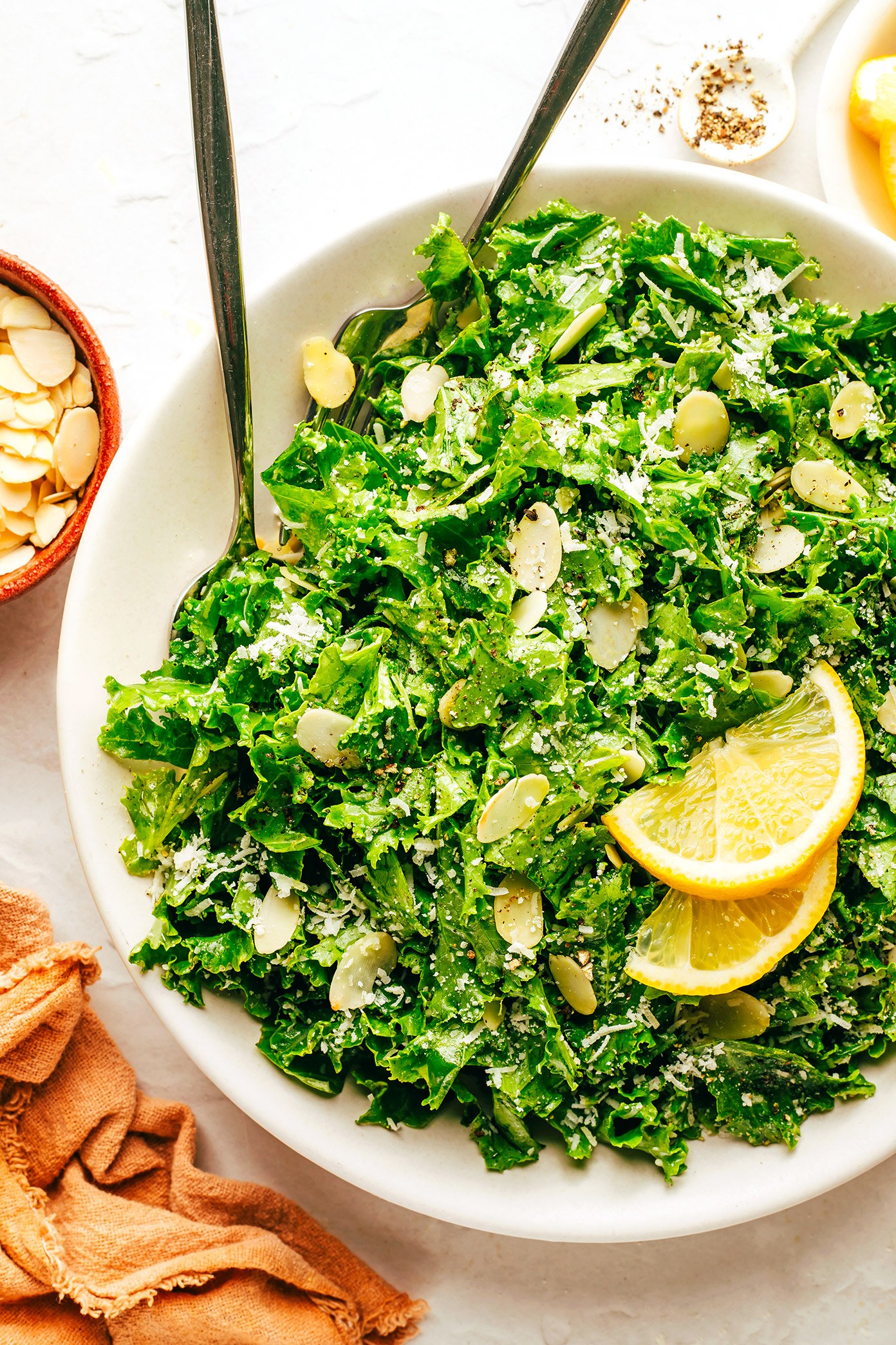 Kale Salad with Lemon, Parmesan and Almonds in Serving Bowl