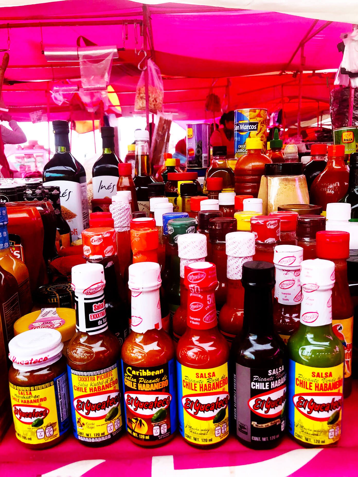 Ali's Guide To Mexico City | Where To Eat (Restaurants), Visit (What To Do), and Stay (Hotels and AirBnBs) in the delicious urban heart of Mexico | gimmesomeoven.com #travel #mexicocity #cdmx #mexico #traveltips #restaurants #food Market Hot Sauces