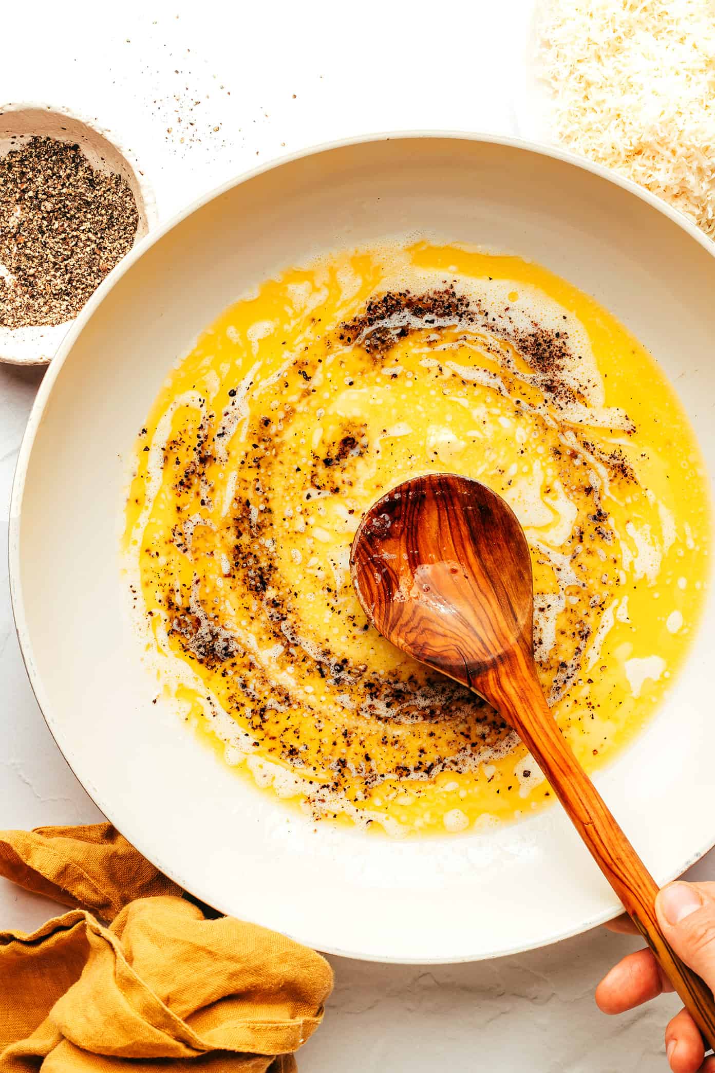 Process photo of making cacio e pepe sauce