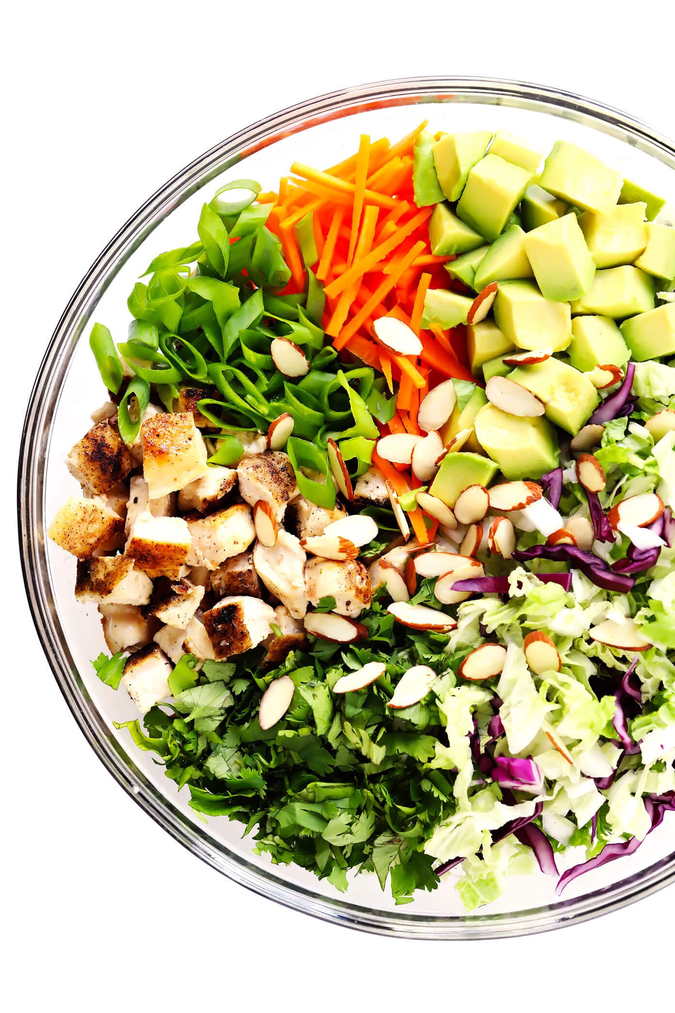 Sesame Chicken Salad Ingredients (Baked Chicken, Green Onions, Carrots, Cilantro, Cole Slaw, Avocado and Toasted Almonds)