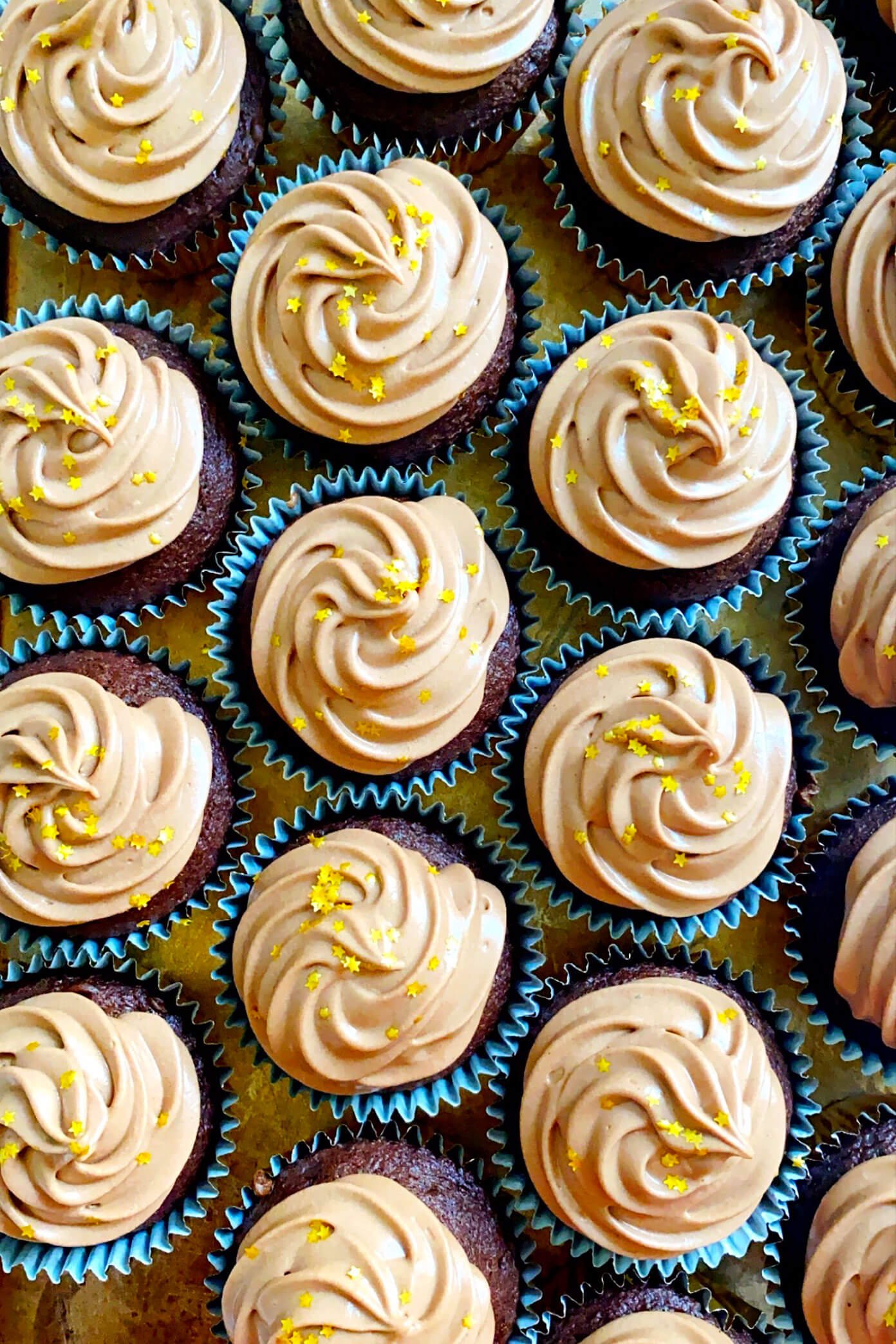 Chocolate cupcakes with gold star sprinkles