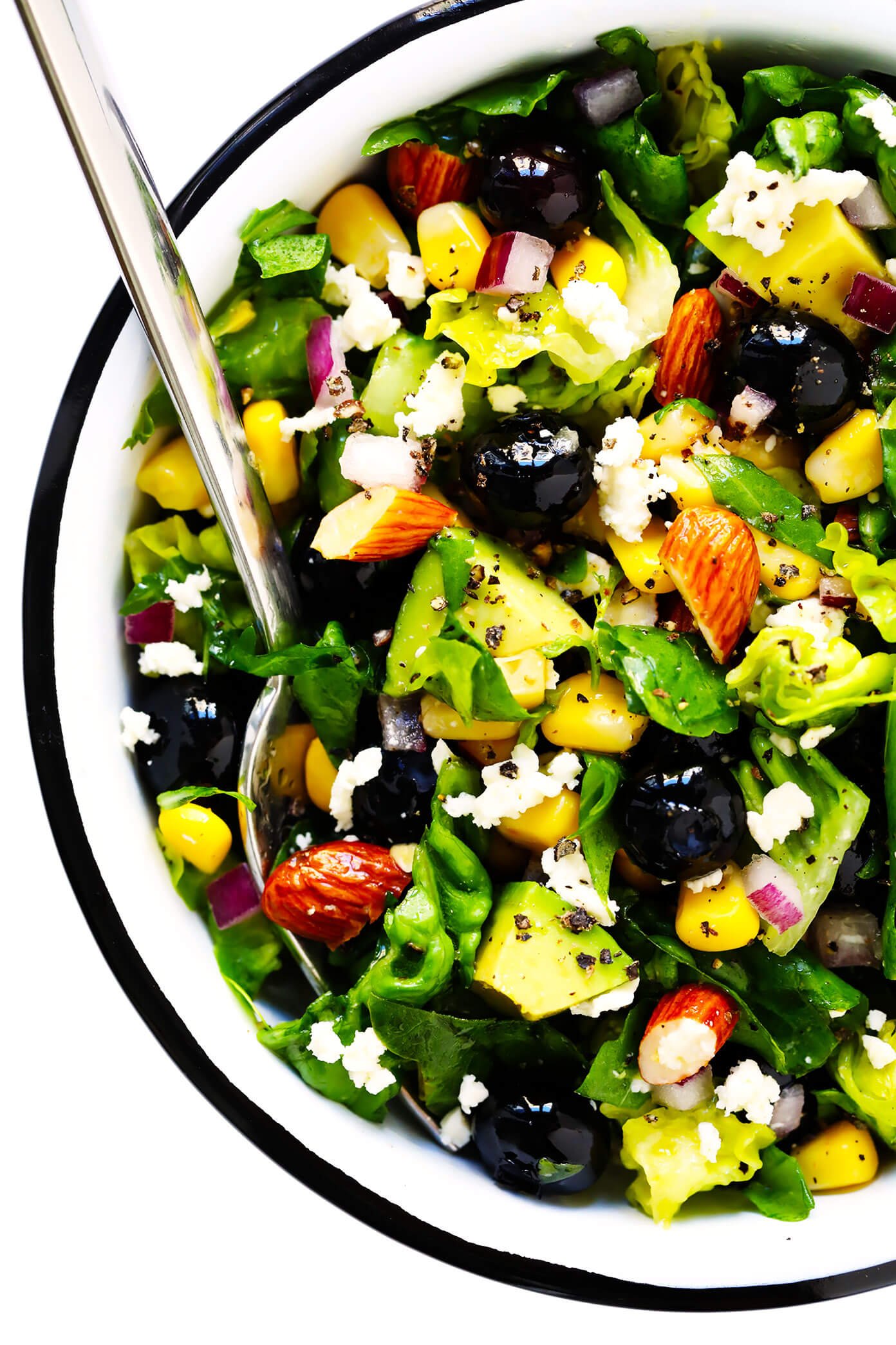 Serving bowl of corn, avocado and blueberry salad