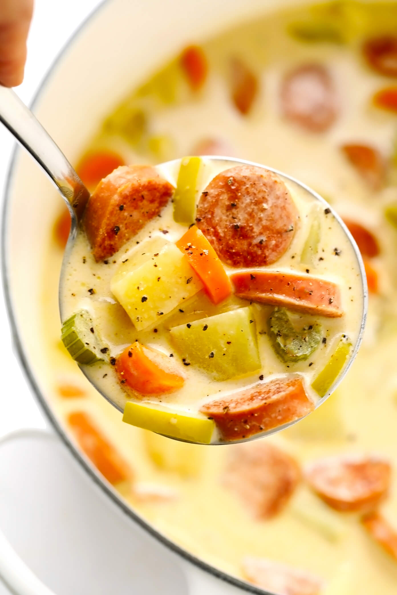 Smoked Sausage, Apple and Potato Soup Closeup in Ladle