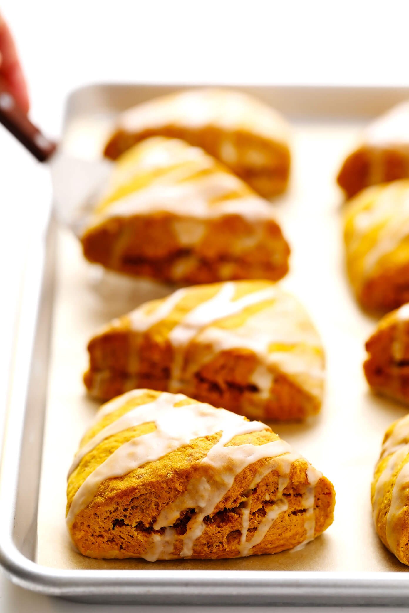 Pumpkin Scones with Vanilla Glaze on Baking Sheet