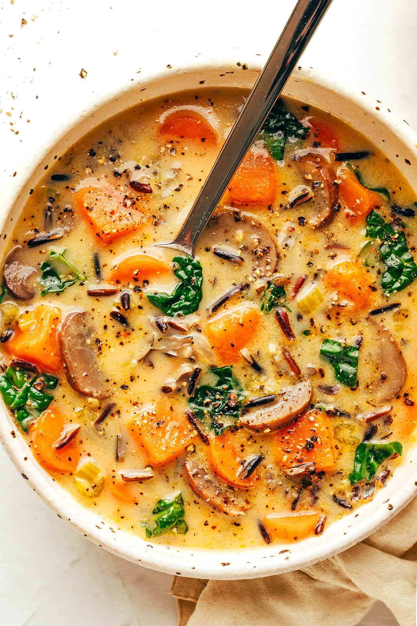 https://www.gimmesomeoven.com/wp-content/uploads/2020/11/Cozy-Autumn-Wild-Rice-Soup-9.jpg