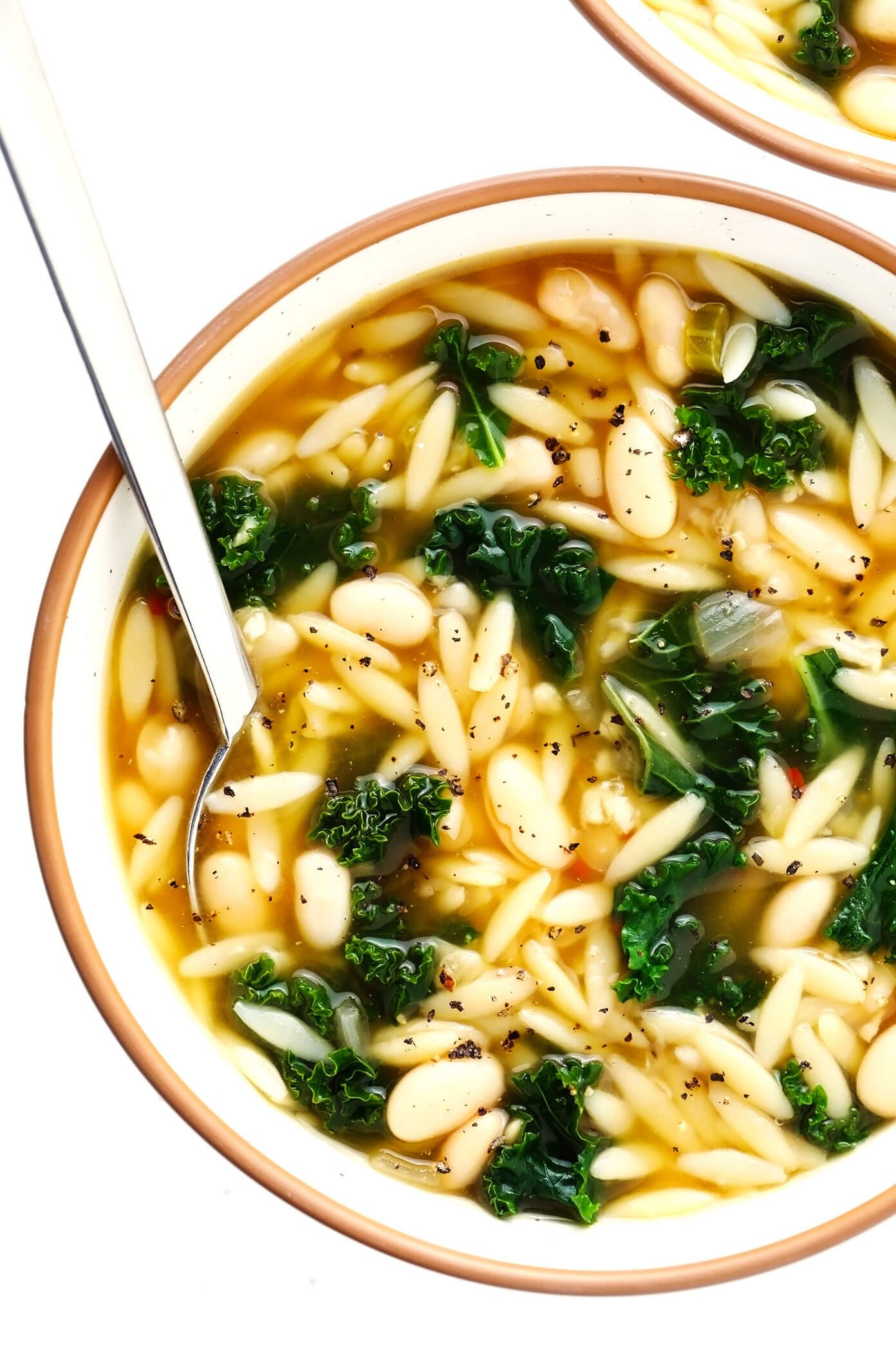 Kale and Orzo Soup in Bowls