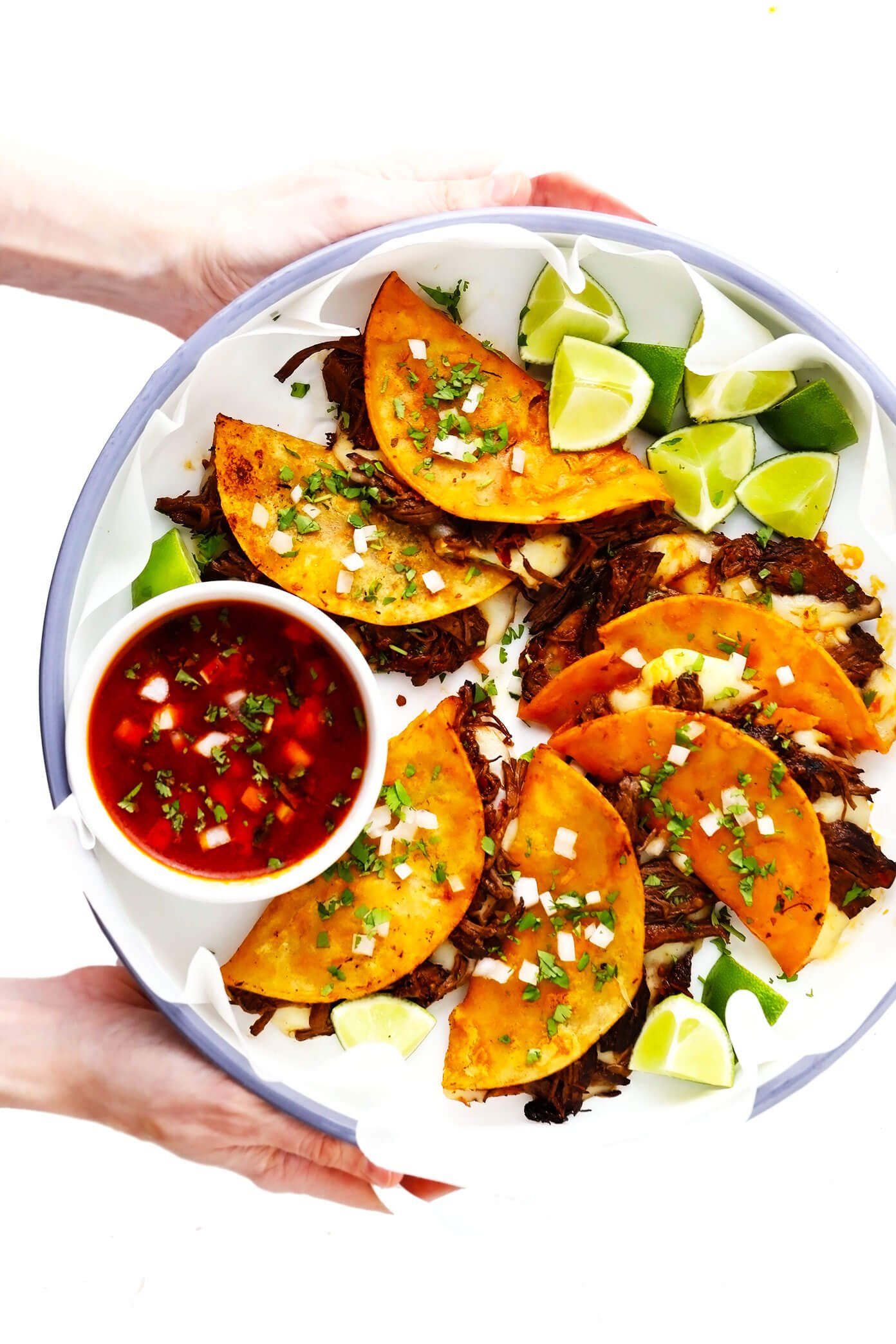 Birria Quesatacos with Limes and Dipping Sauce