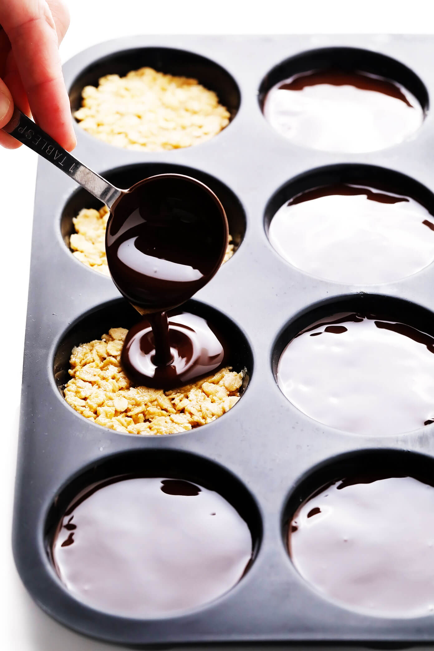 Drizzling Chocolate onto Salted Chocolate Peanut Butter Oat Cups