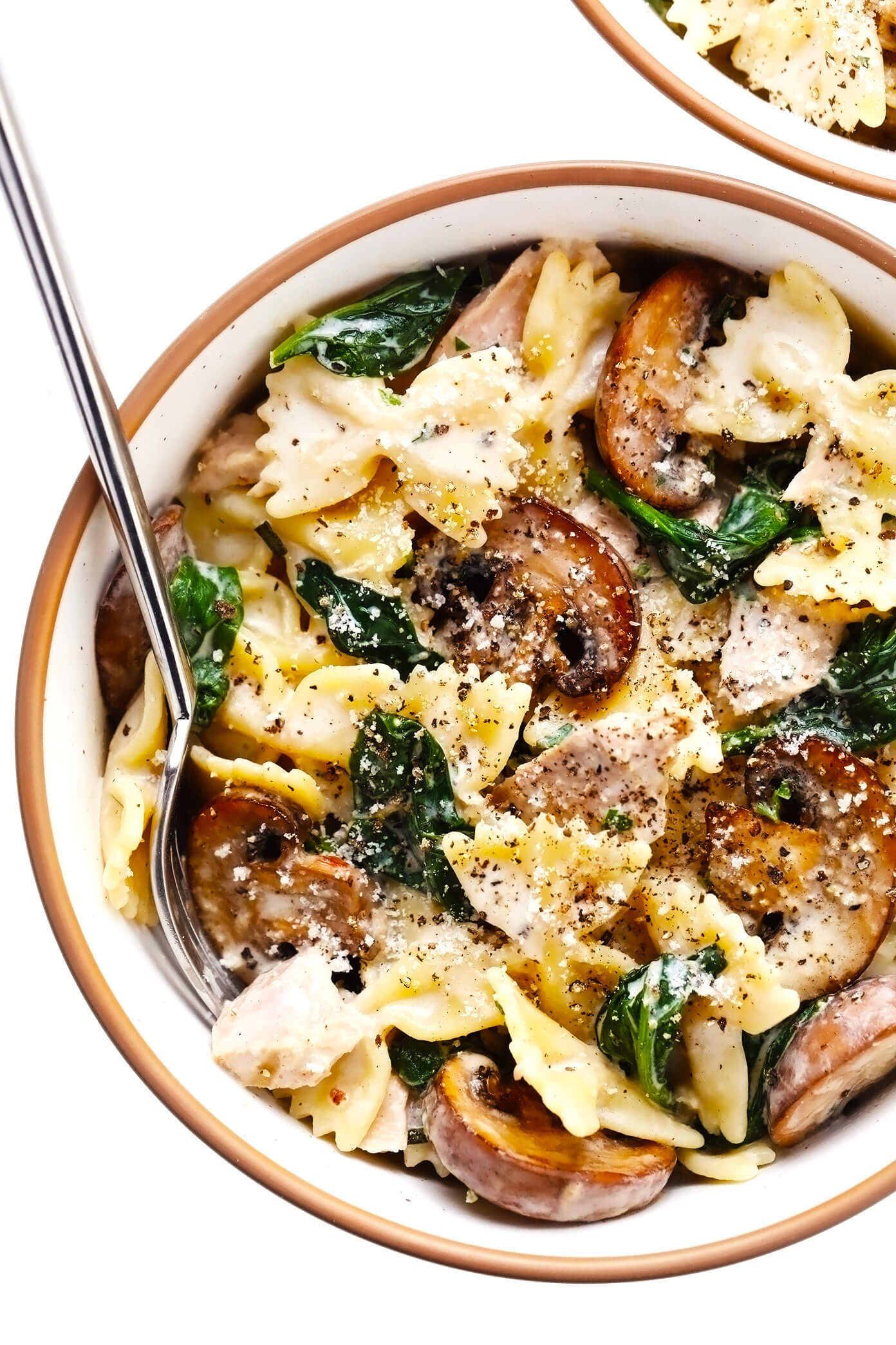 Creamy Tuna Mushroom Pasta in Serving Bowl with Parmesan and Black Pepper