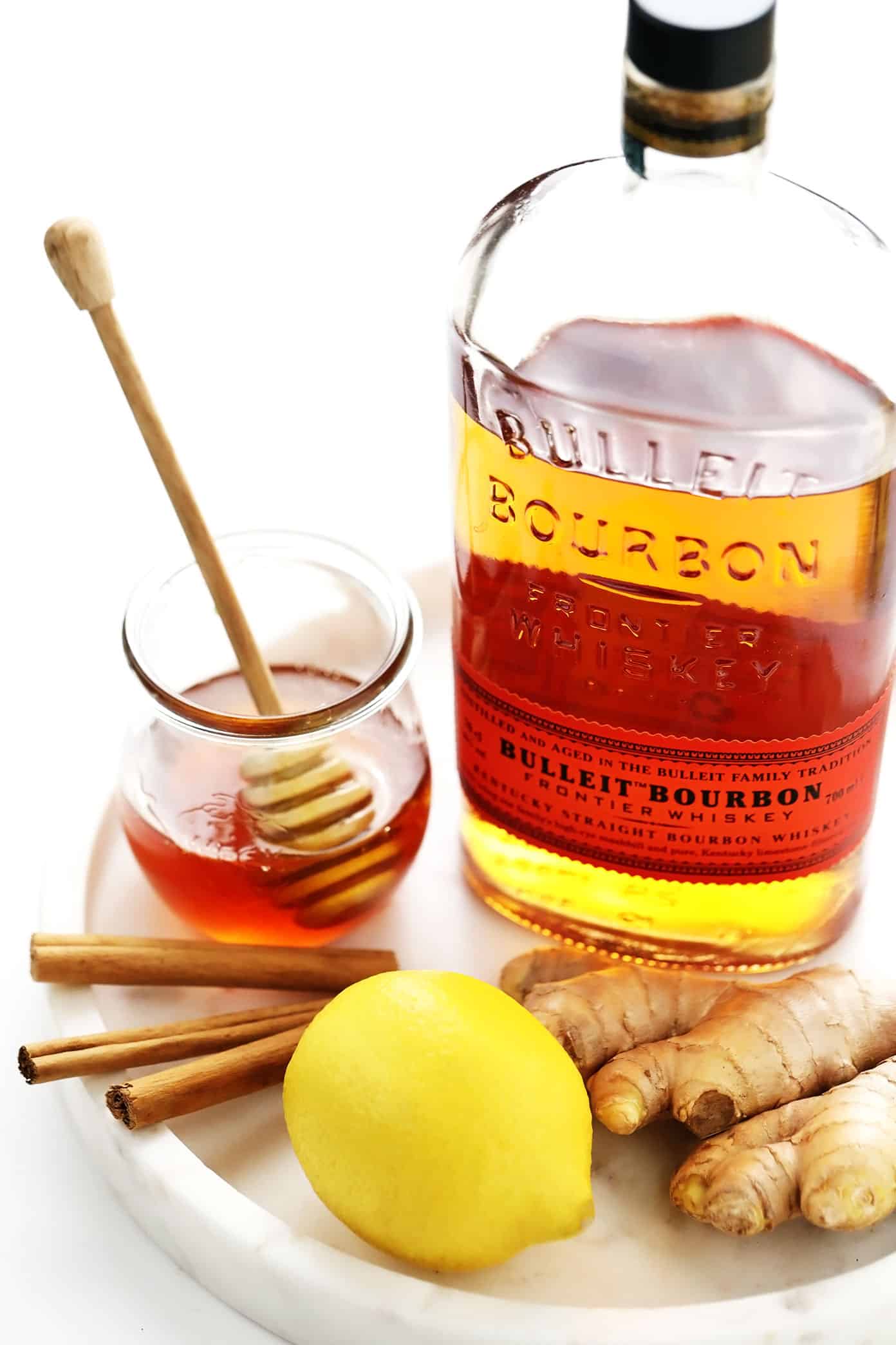 Hot Toddy Ingredients: bourbon, honey, lemon, cinnamon sticks and ginger