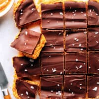 Chocolate peanut butter bars on cutting board