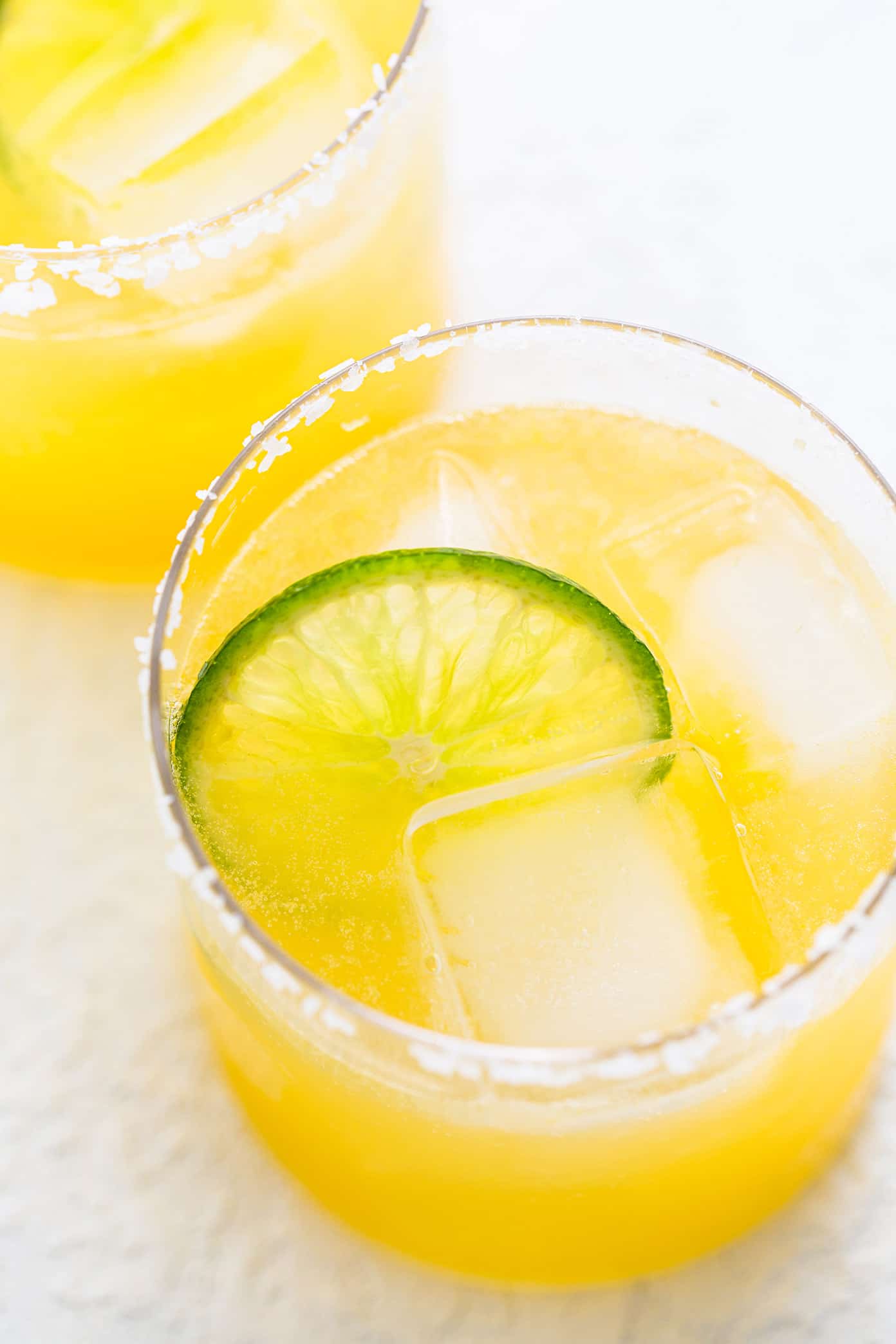 Virgin Margarita Mocktail in Glasses with Lime and Salt Rims