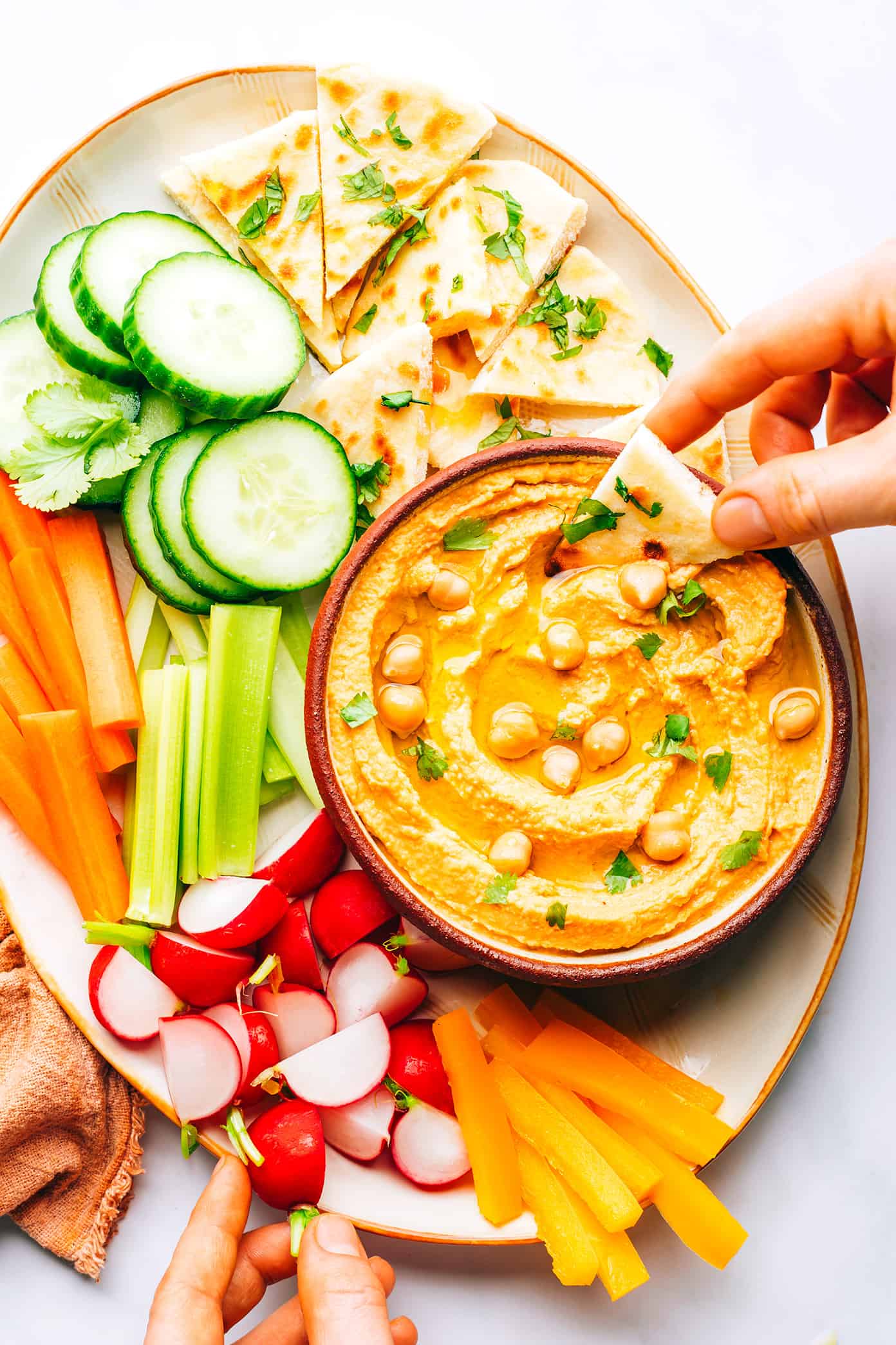 Thai Red Curry Hummus on Platter with Crudites and Naan