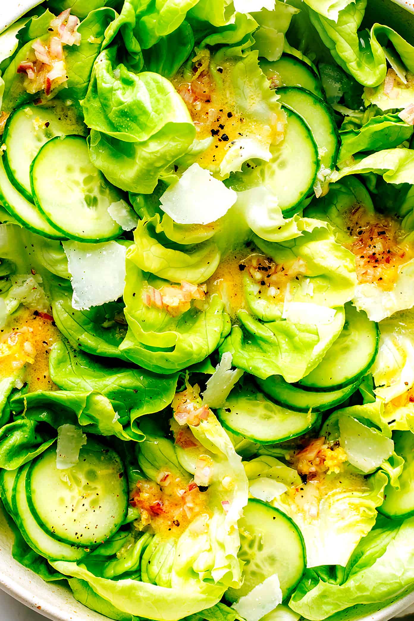 Butter lettuce salad with french dressing close-up