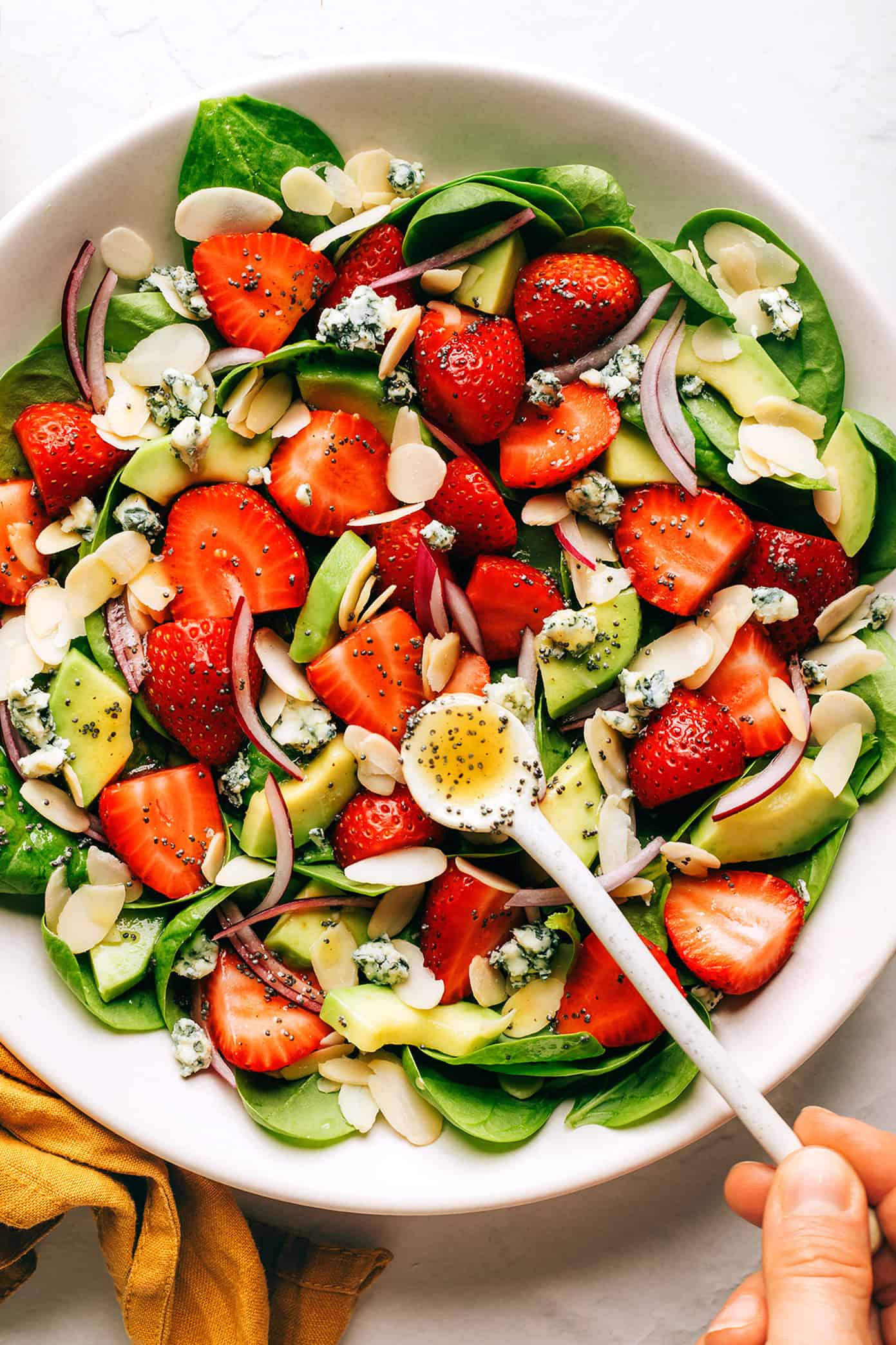 Strawberry and spinach salad with poppy seed dressing