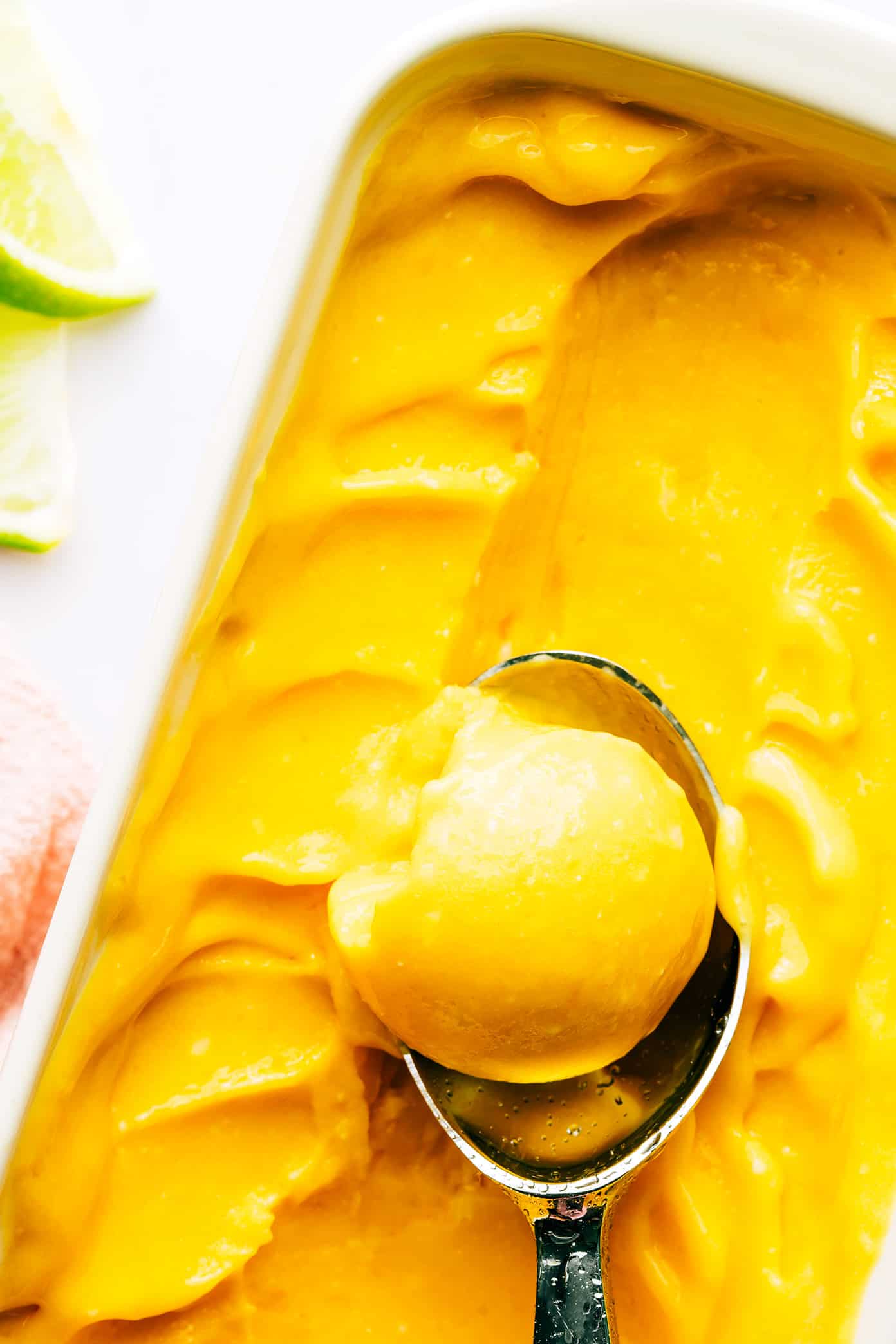 Mango Lime Sorbet in Pan with Ice Cream Scoop