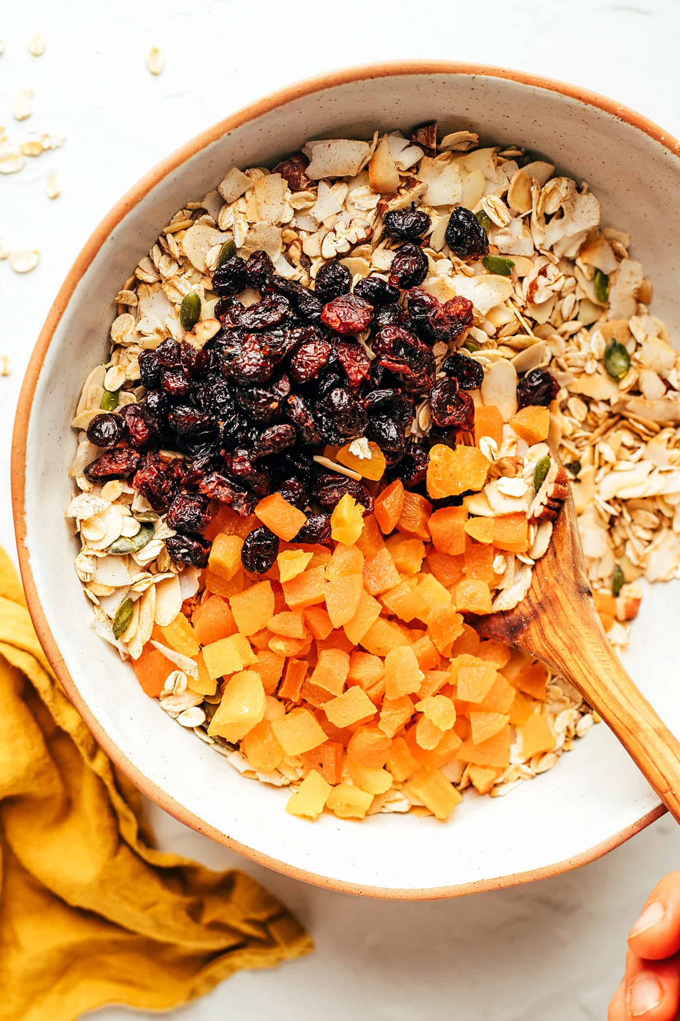 Muesli ingredients in mixing bowl