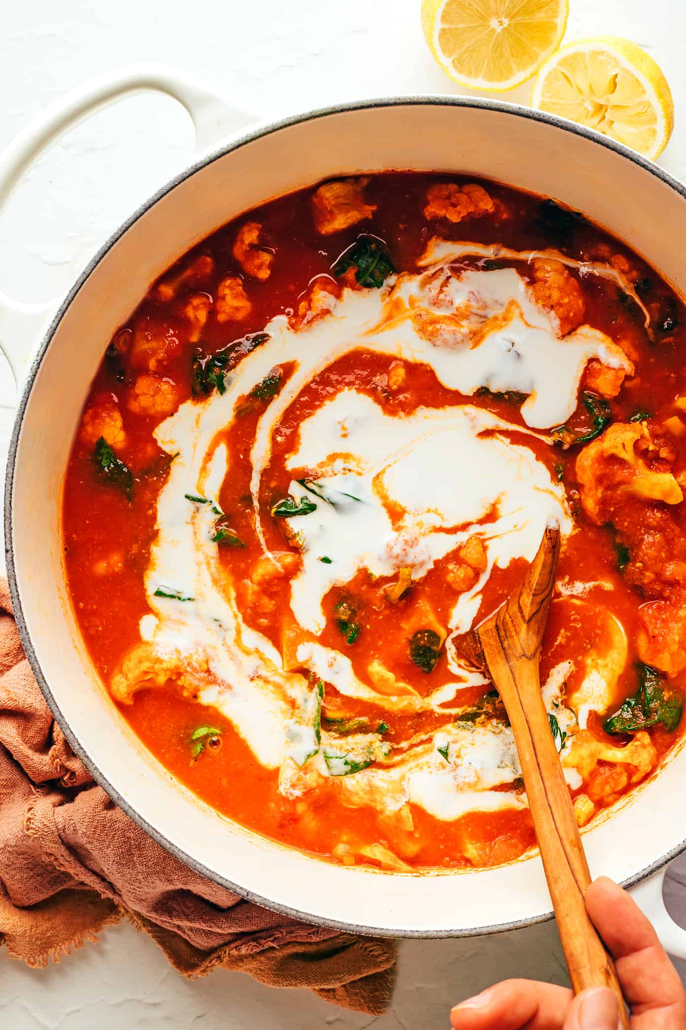 Stirring Coconut Milk Into Butter Chicken and Cauliflower