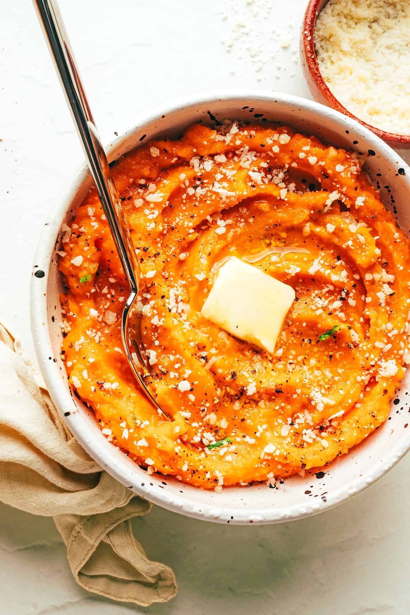 Garlic Parmesan Mashed Sweet Potatoes with Butter in Bowl