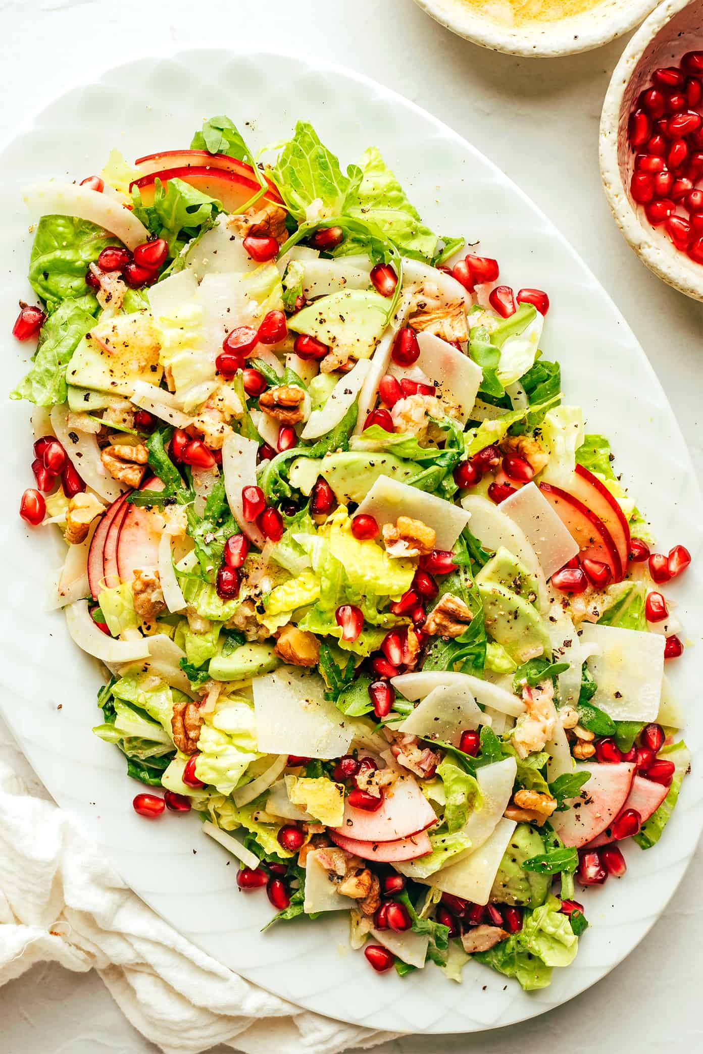 Thanksgiving Green Salad on platter (with pomegranate, apple, avocado, Parmesan, fennel and walnuts)