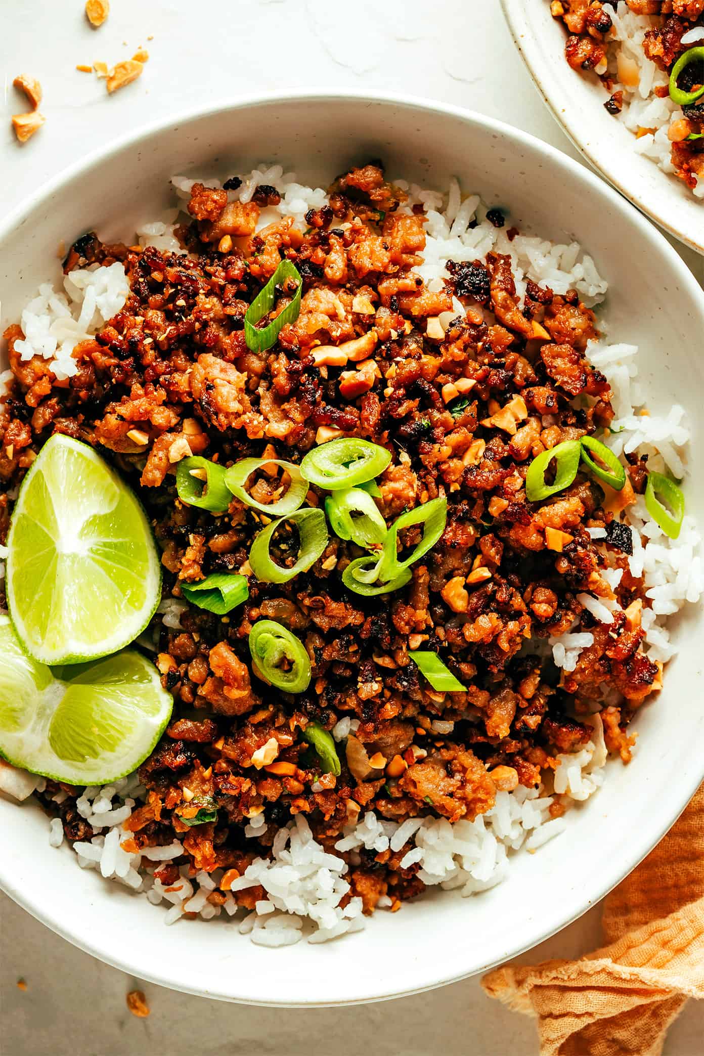 Ginger Lime Pork with Coconut Rice in Bowls with Lime