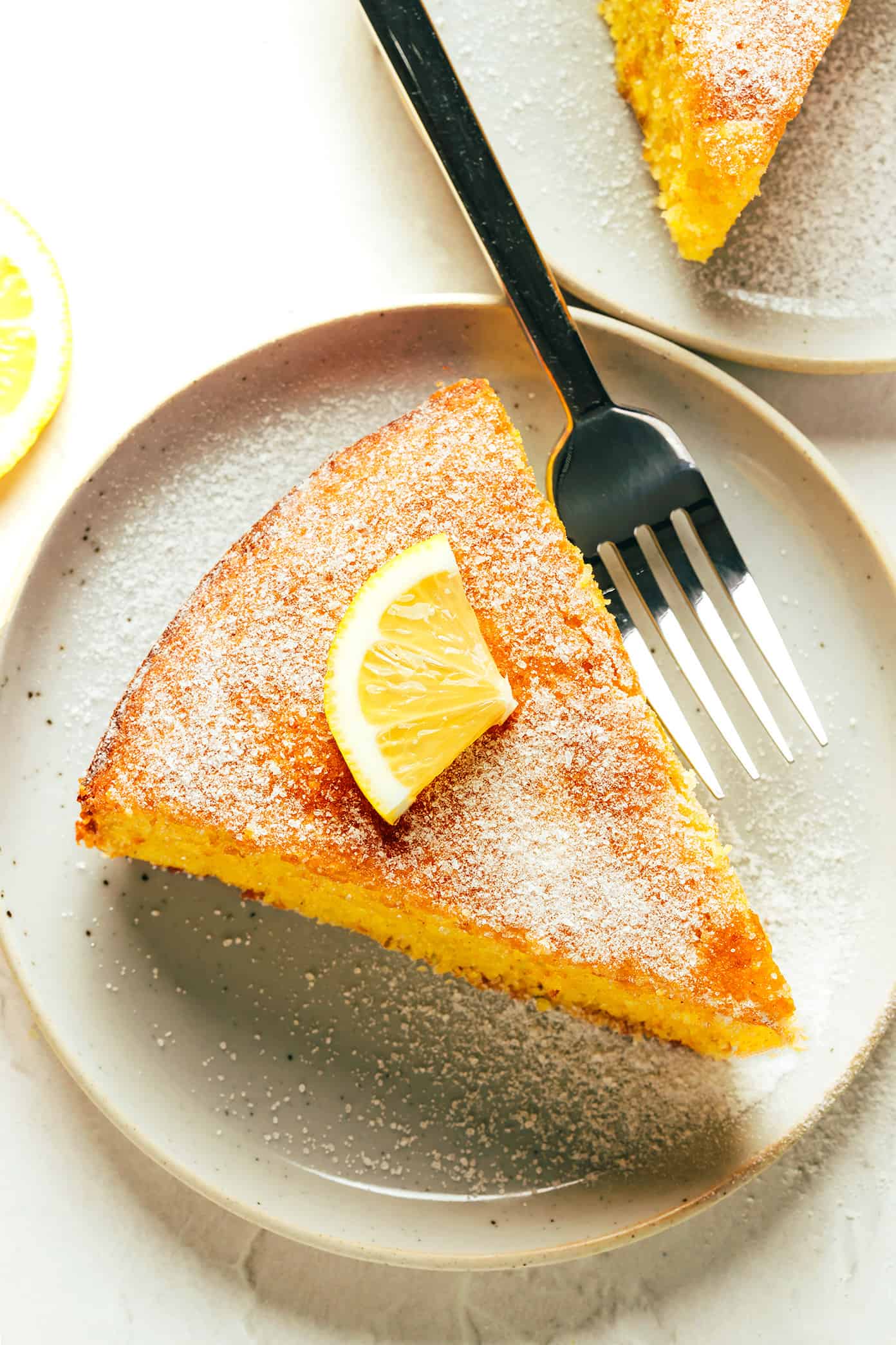 Slice of Citrus Olive Oil Cake with Fork