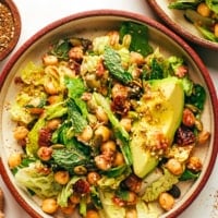 Chickpea date and avocado salad in bowls