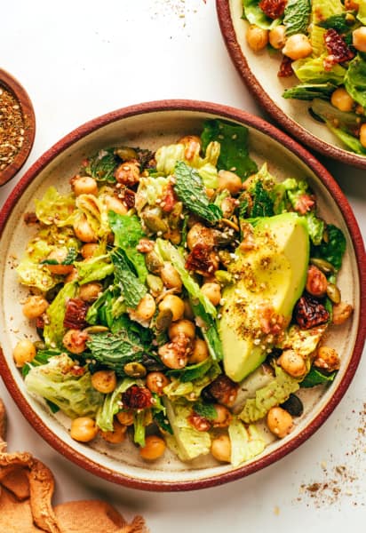 Chickpea date and avocado salad in bowls