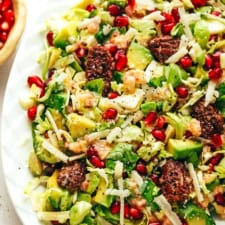 Brussels Sprouts Arugula Salad with Pomegranate and Candied Pecans-image