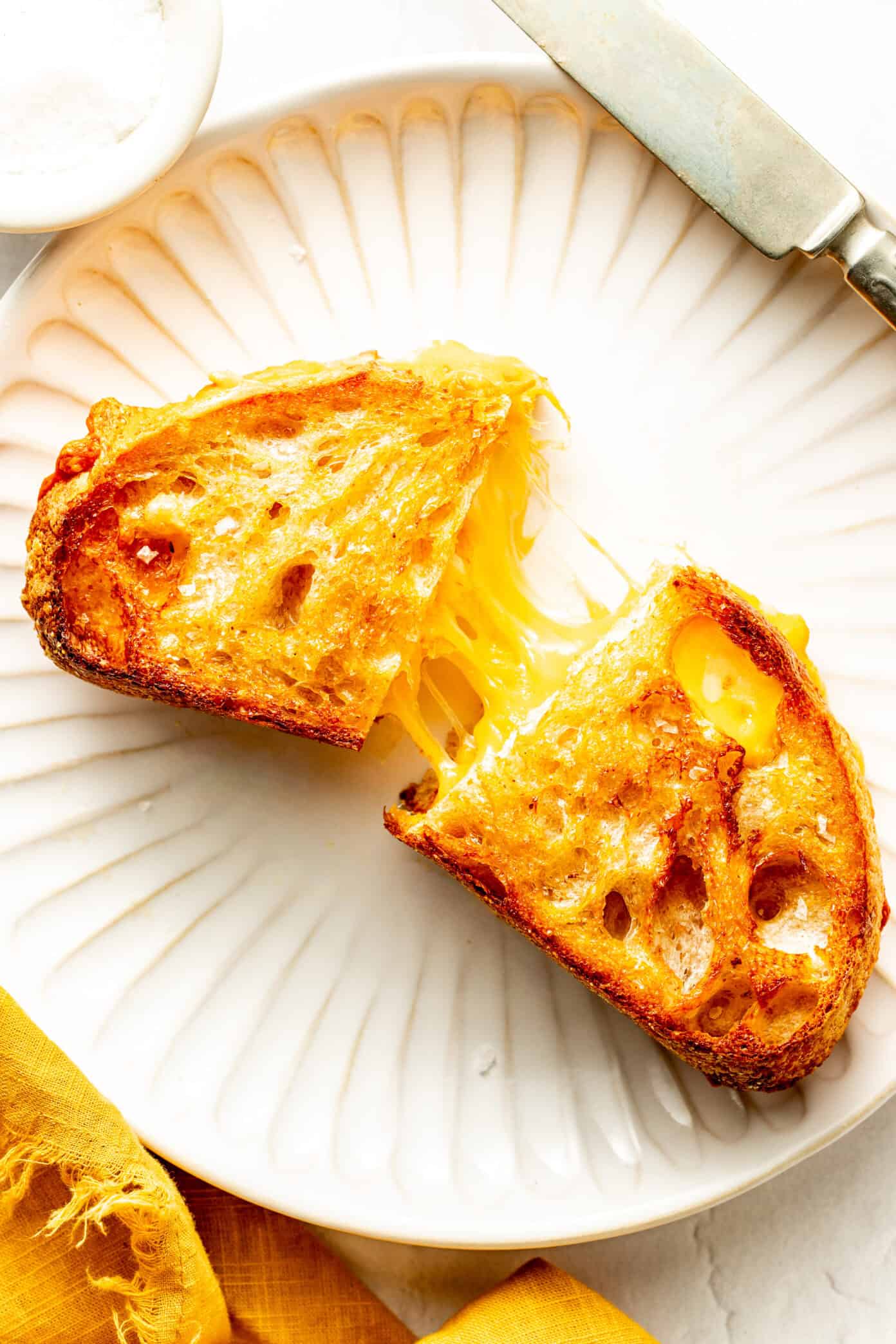 air fryer grilled cheese with melty cheese and a sprinkle of flaky sea salt