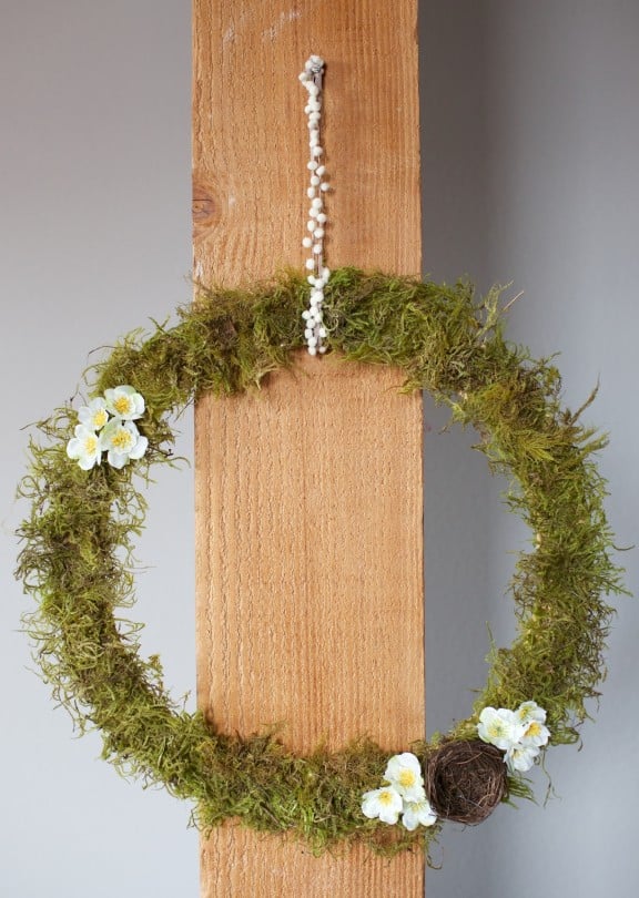 Celebrate Easter and welcome spring with this simple DIY moss wreath! | www.gimmesomestyleblog.com #diy #wreath #spring #easter